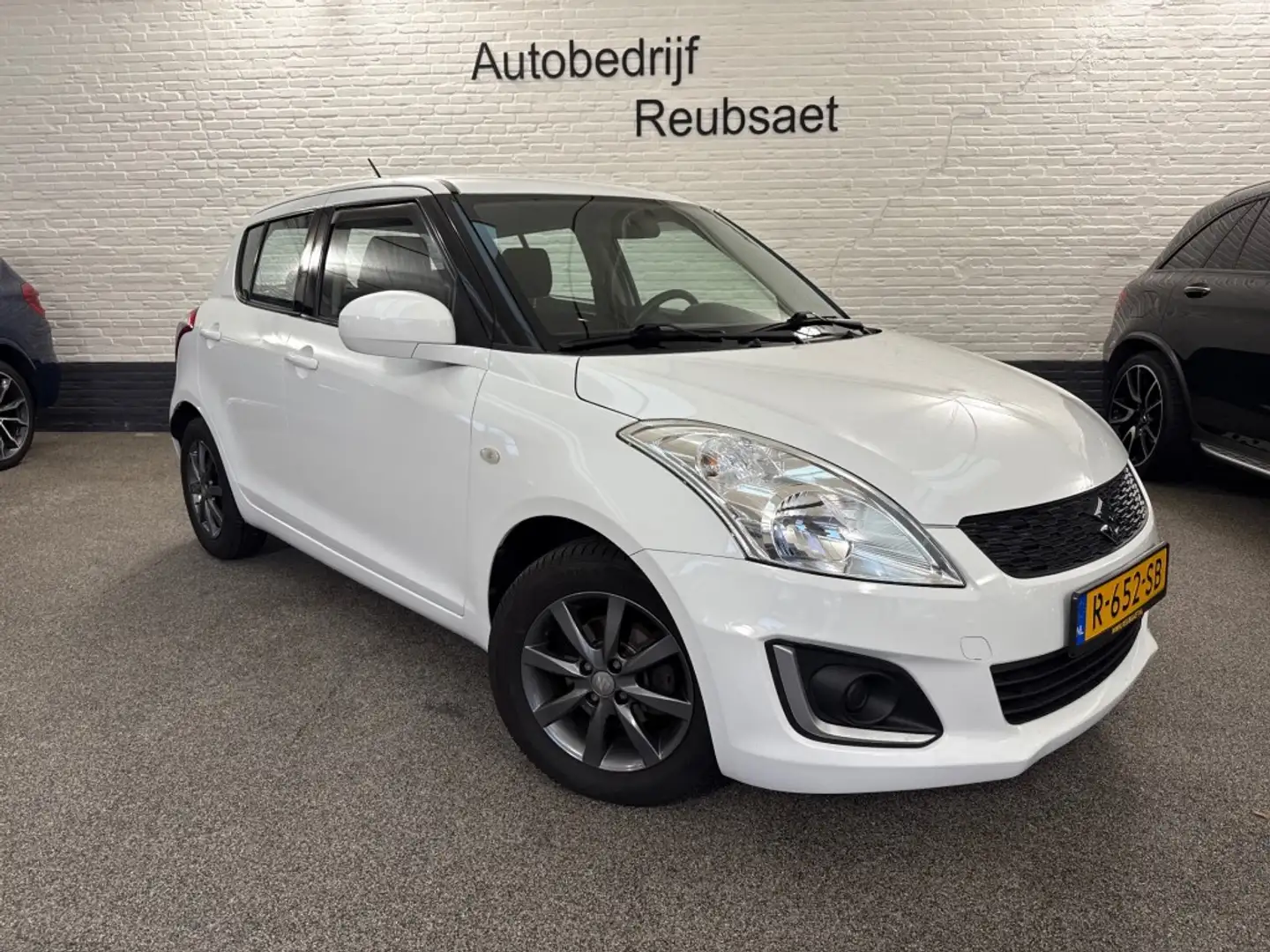 Suzuki Swift 1.2 Comfort Easss 5Drs Airco Elek Pakket Incl Gara Wit - 1