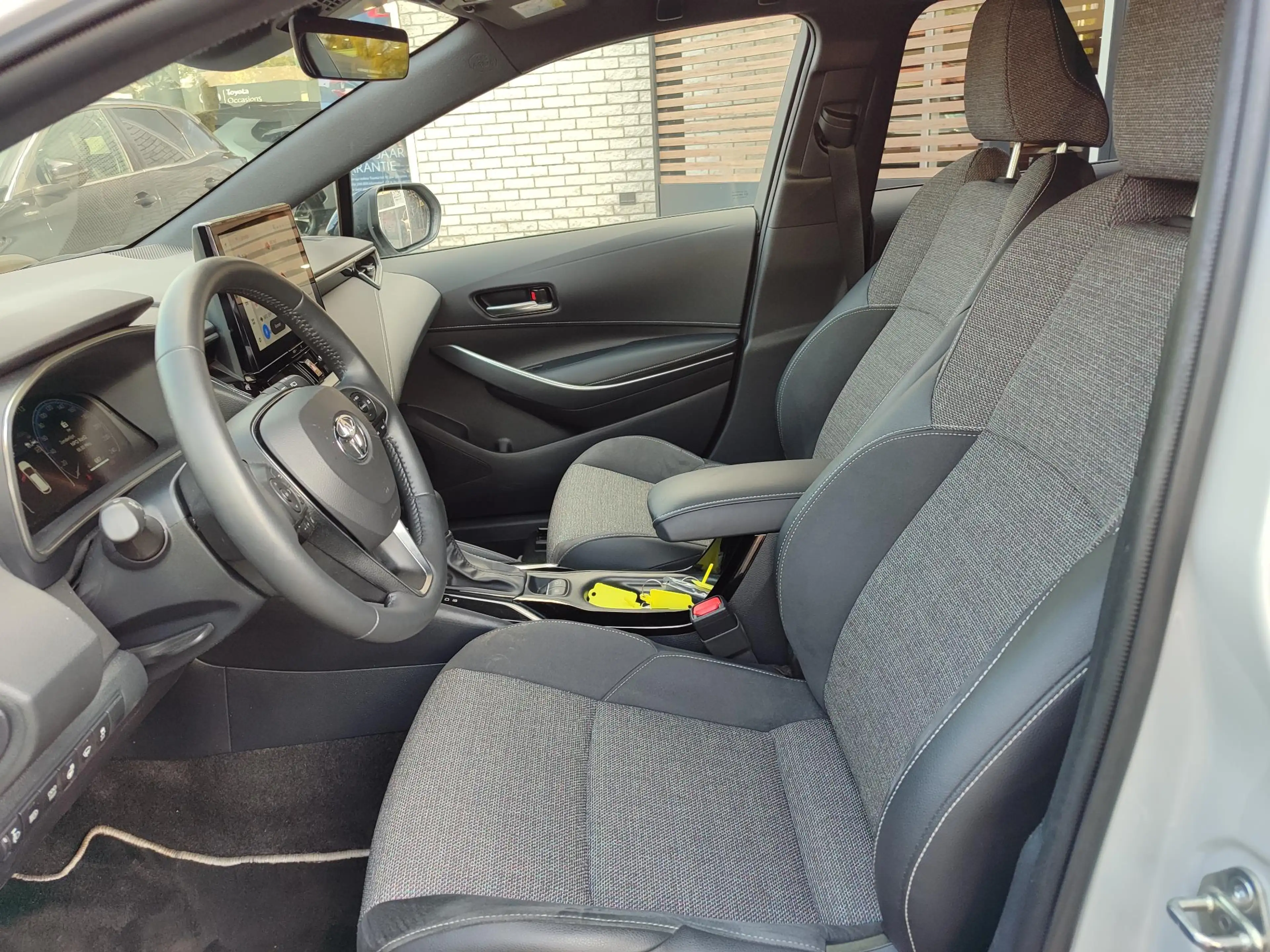 Toyota Corolla Touring Sports Hybrid 140 DYNAMIC STOEL/STUURVERW — photo 9