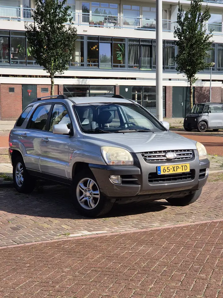 Kia Sportage 2.0 2WD LX — photo 1 of 17