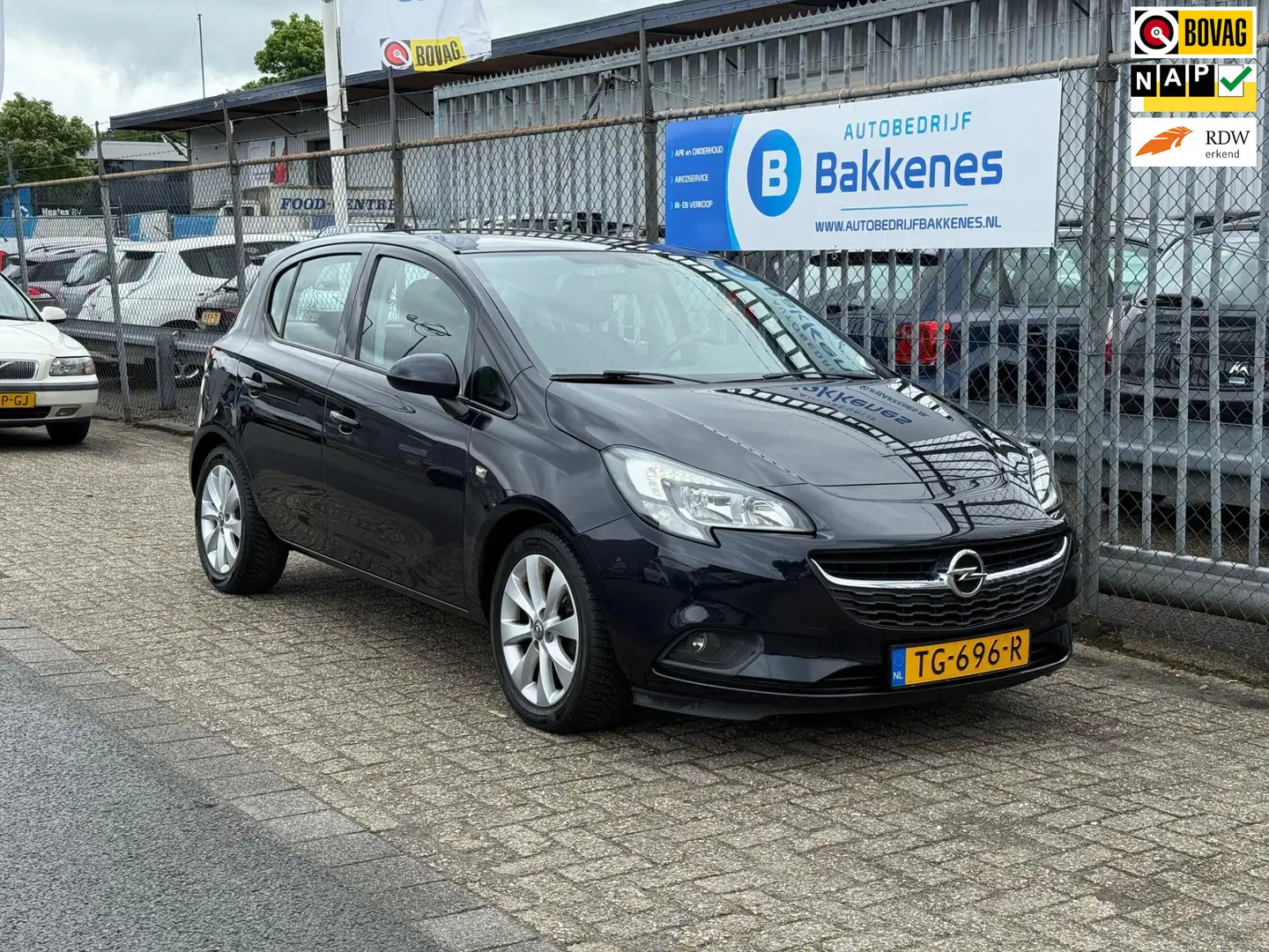 Opel Corsa 1.4 Favourite | Airco | Cruise | Carplay Blau - 1