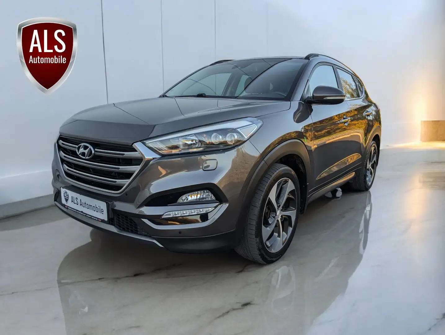 Hyundai TUCSON Hyundai Tucson Premium 4WD"Leder"Navi"Pano"Voll" Grau - 1