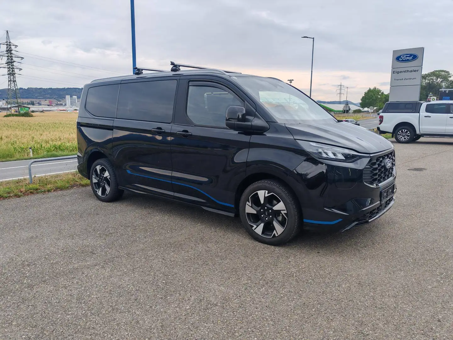 Ford Tourneo Custom Tourneo Custom Bus 2.5 PHEV 340 L1H1 FWD Sport Aut. Sport Schwarz - 1