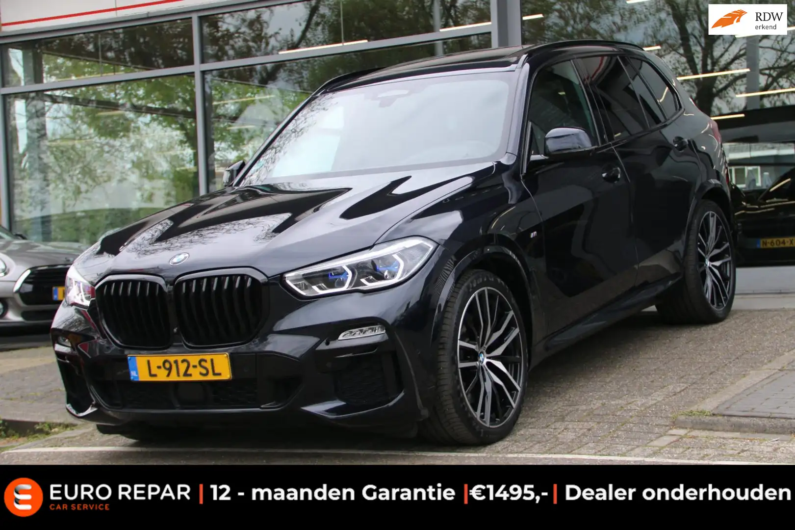 BMW X5 XDrive40d High Executive M-PAKKET NL-AUTO PANO! Zwart - 1