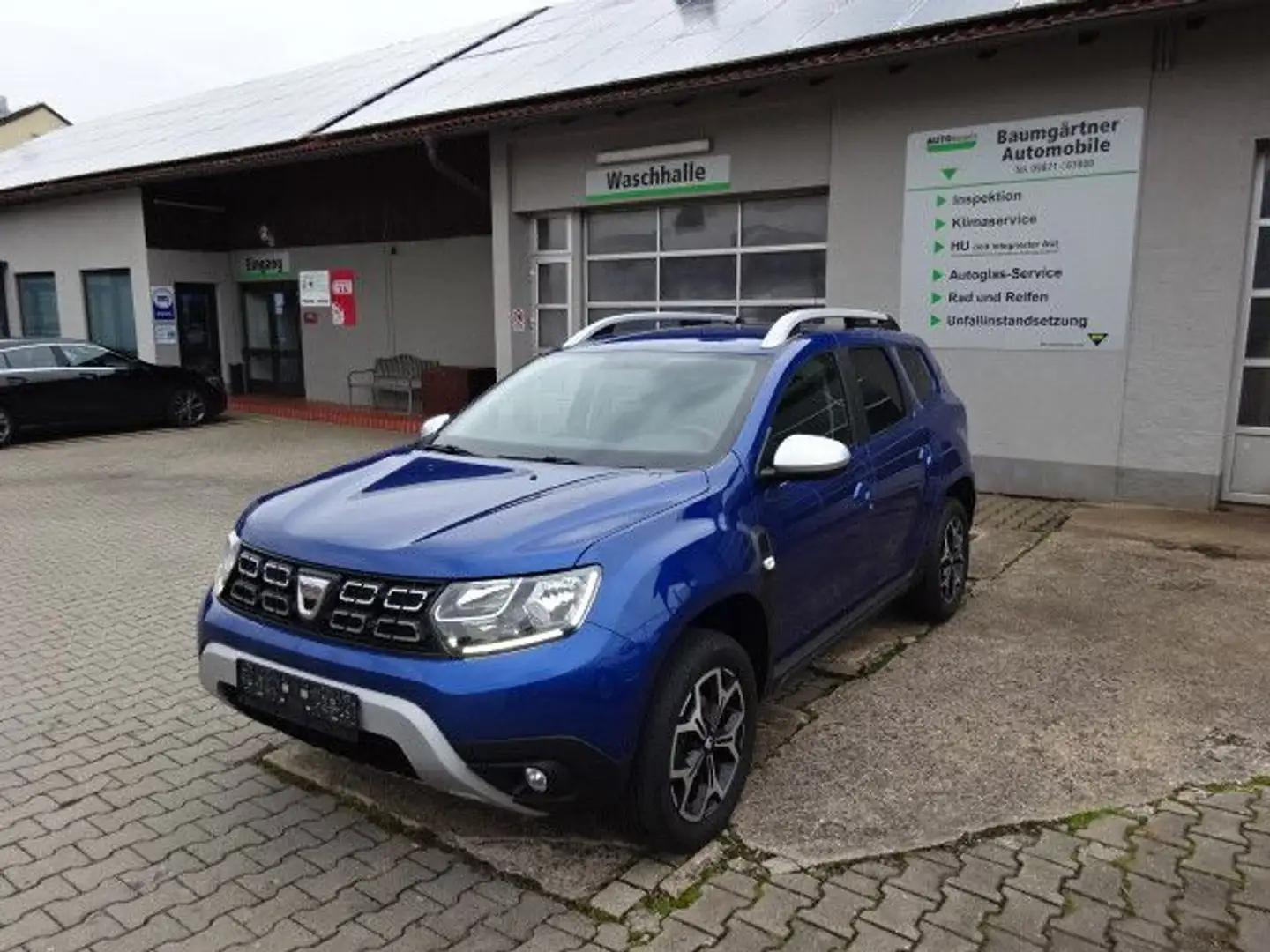 Dacia Duster II TCe 130 - 1.Hand--AHK--Navi--SHZ--PDC Blau - 1
