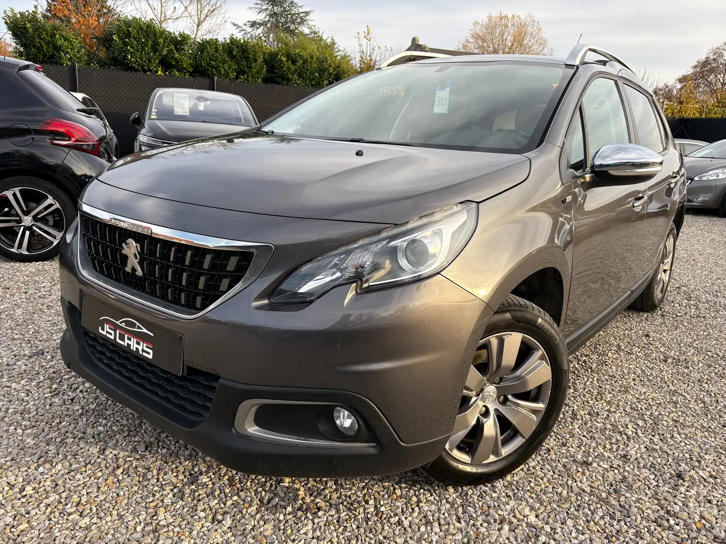 Peugeot 2008 1.2i*STYLE*GPS*AIRCO*PDC*CRUISE*BLETOOTH* Gris - 1