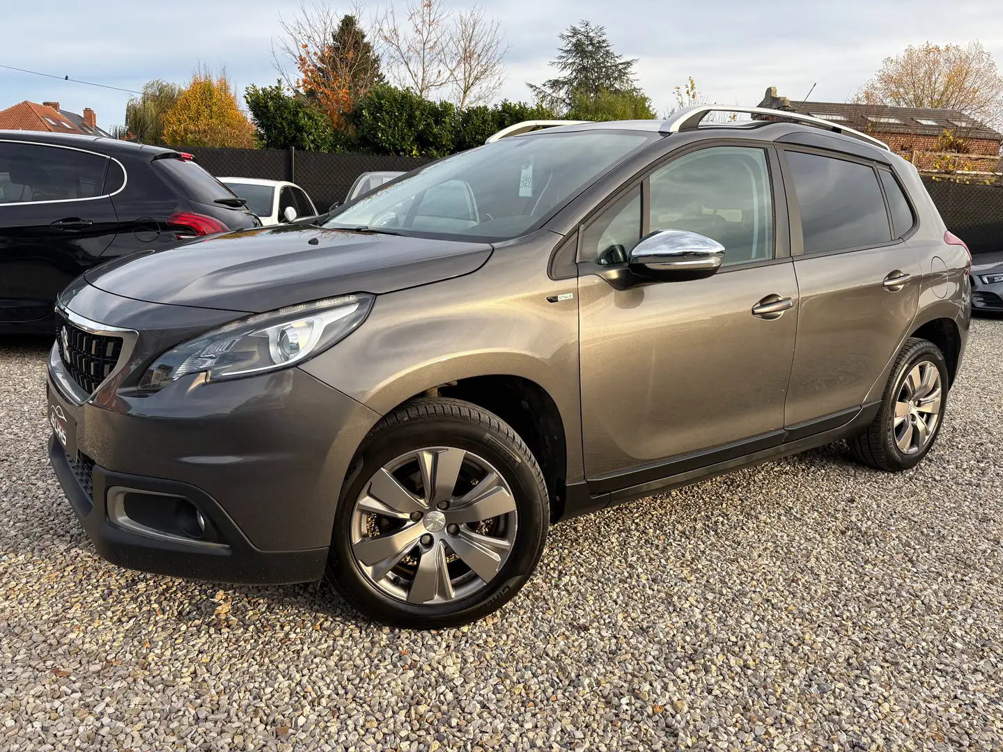 Peugeot 2008 1.2i*STYLE*GPS*AIRCO*PDC*CRUISE*BLETOOTH* Gris - 2