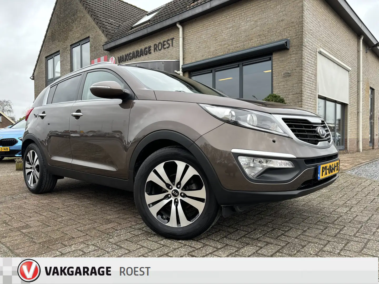 Kia Sportage 2.0 Automaat X-clusive First Edition Trekhaak / Ca Bruin - 1