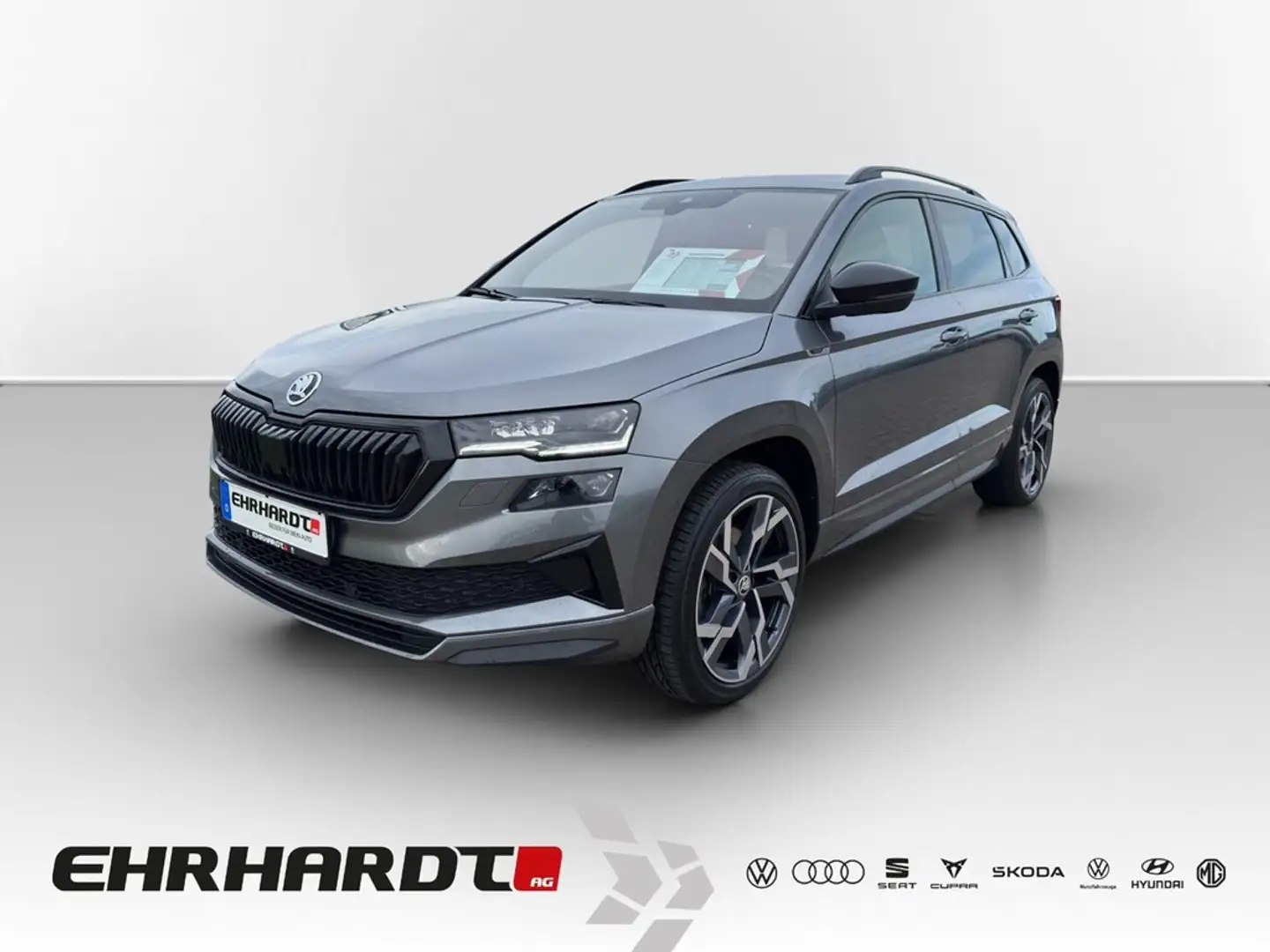 Skoda Karoq 2.0 TDI DSG 4x4 Sportline DCC AHK*MATRIX*NAV*SH... Grau - 1