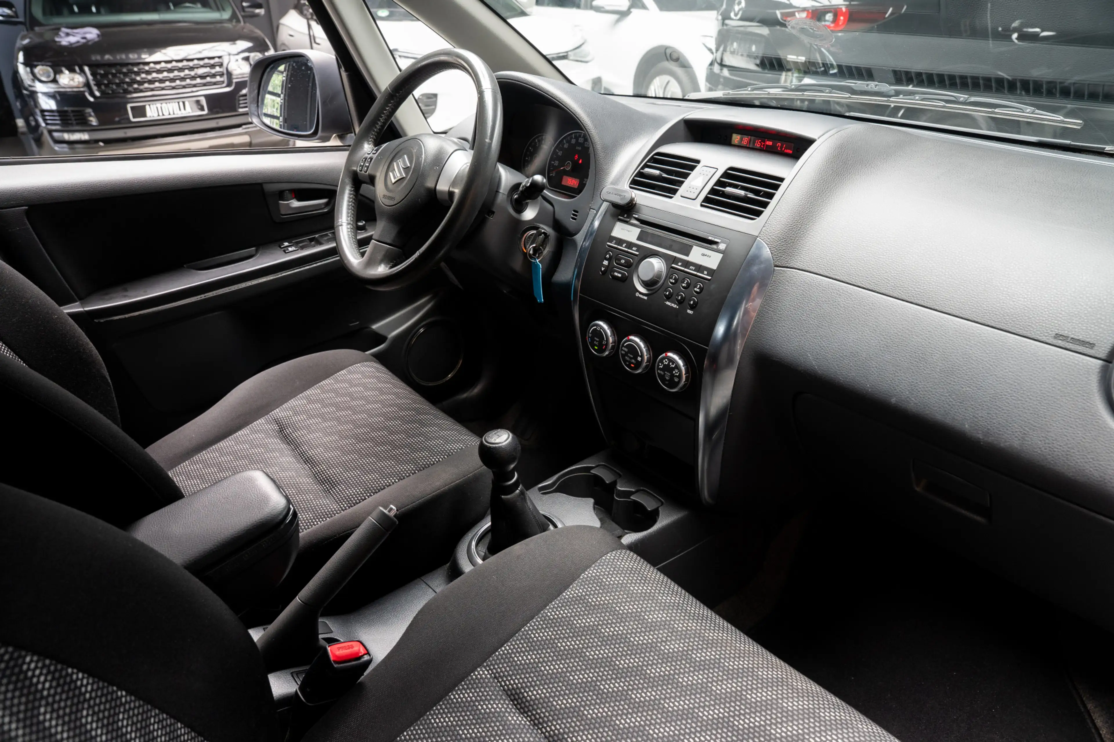 Suzuki SX4 1.6 Comfort — photo 13