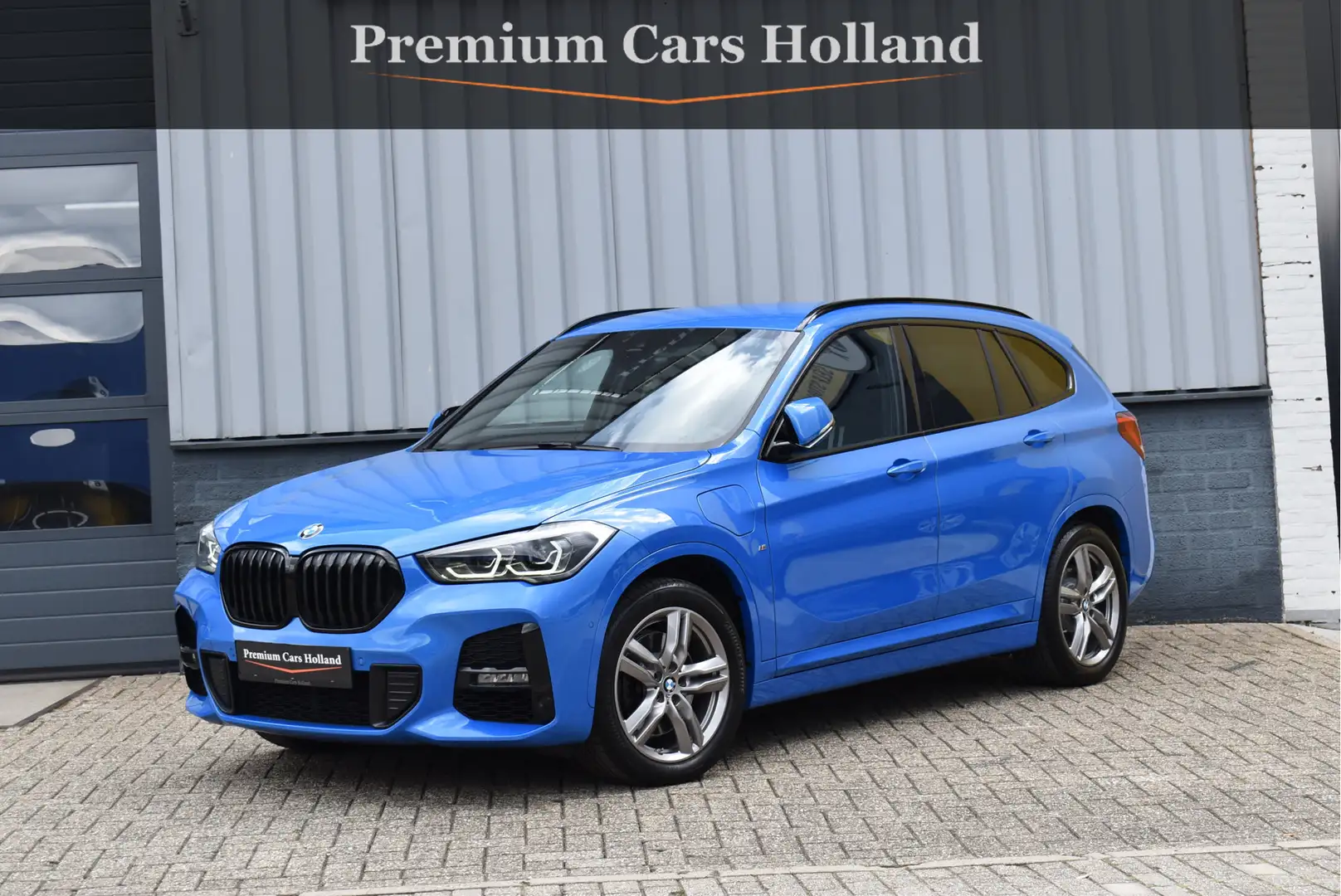 BMW X1 xDrive25e M-Pakket 220 Pk Navi Camera Leder Sfeer Blauw - 1