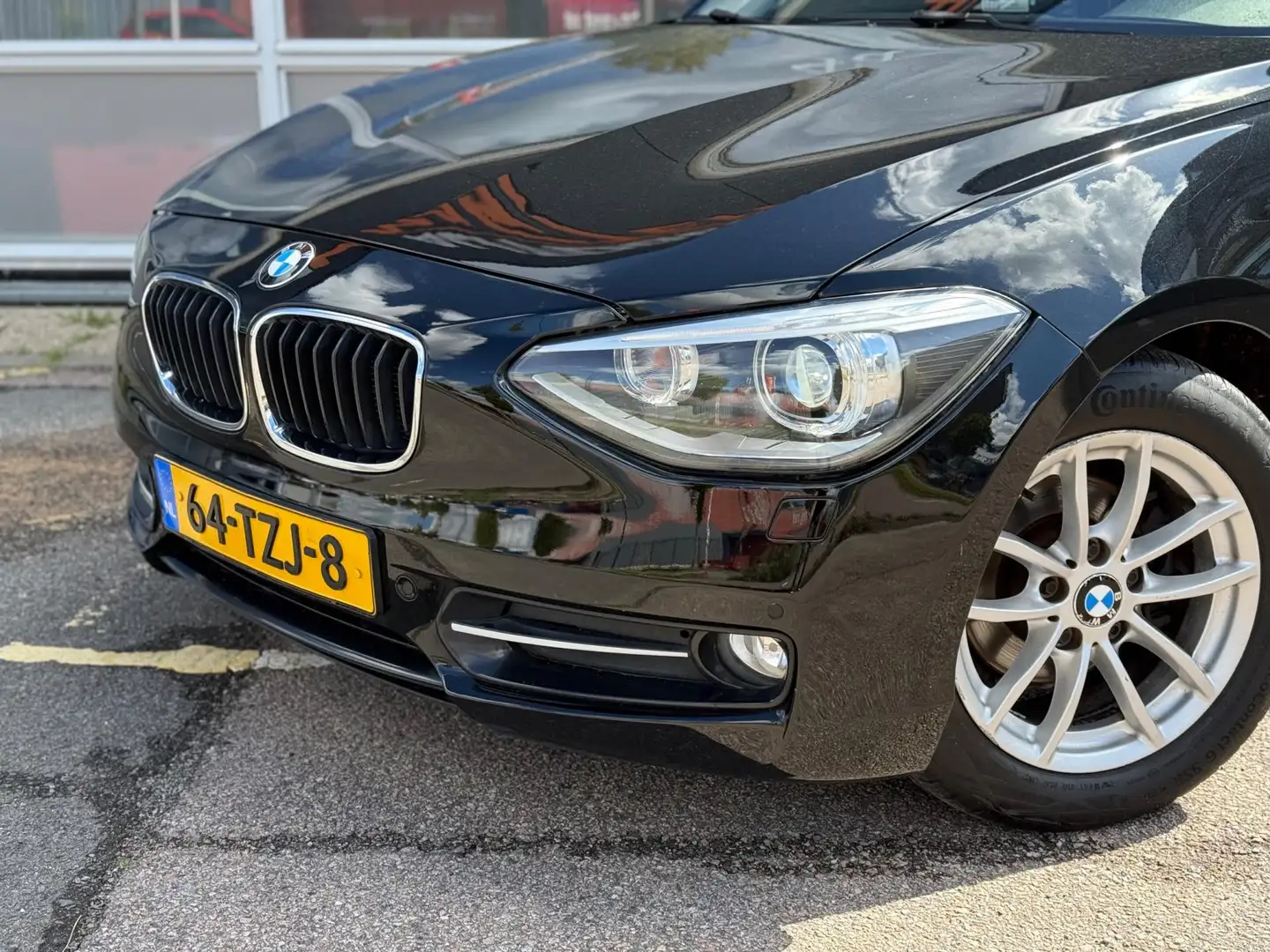 BMW 116 1-serie 116i Business+ | NAP | Cruise | Airco Zwart - 2