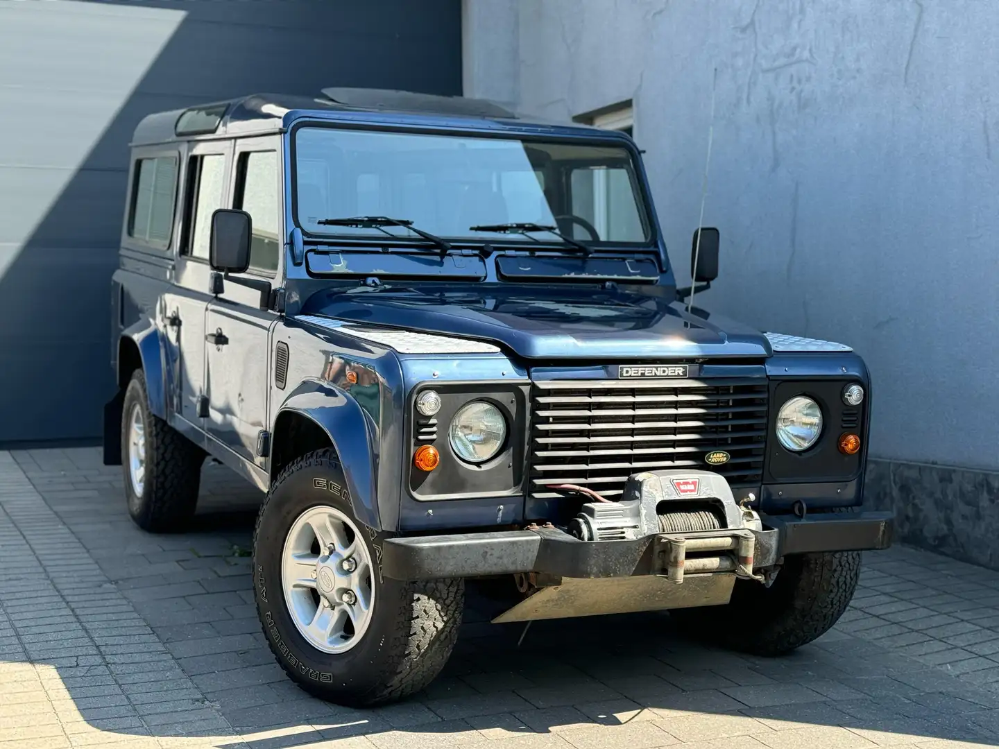 Land Rover Defender 2.5 Td5 TD5 110 9 zitplaatsen 2006 138000 km Blauw - 1
