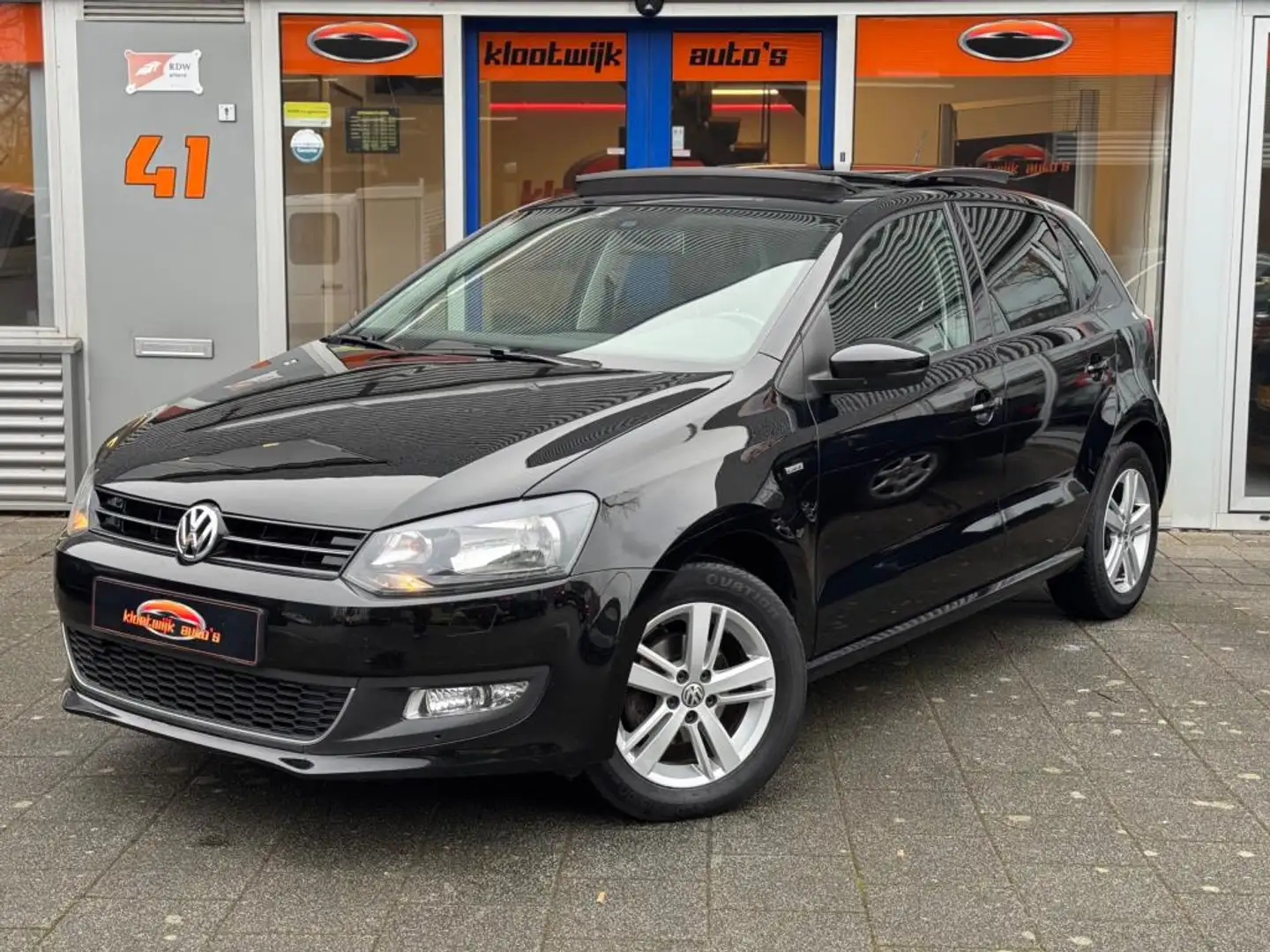 Volkswagen Polo 1.2 TSI Edition DSG Panorama Navigatie 5-Deurs LM Zwart - 1