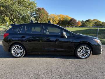 5dr HB CVT 2.0i w/Touring Pkg
