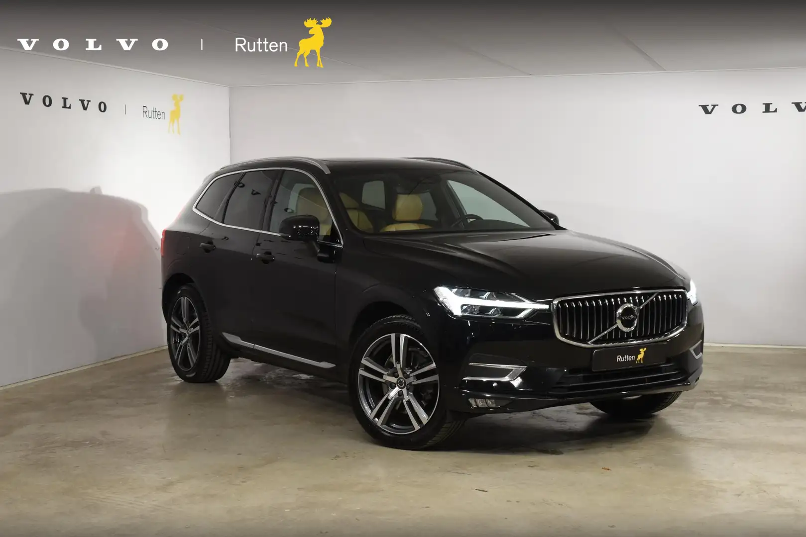 Volvo XC60 T5 250PK AWD Inscription / Navigatie / Cruise Cont Zwart - 1