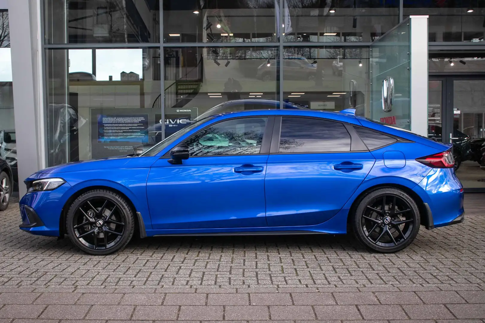 Honda Civic 2.0 e:HEV Sport Automaat -All in rijklaarprijs | 1 Bleu - 2