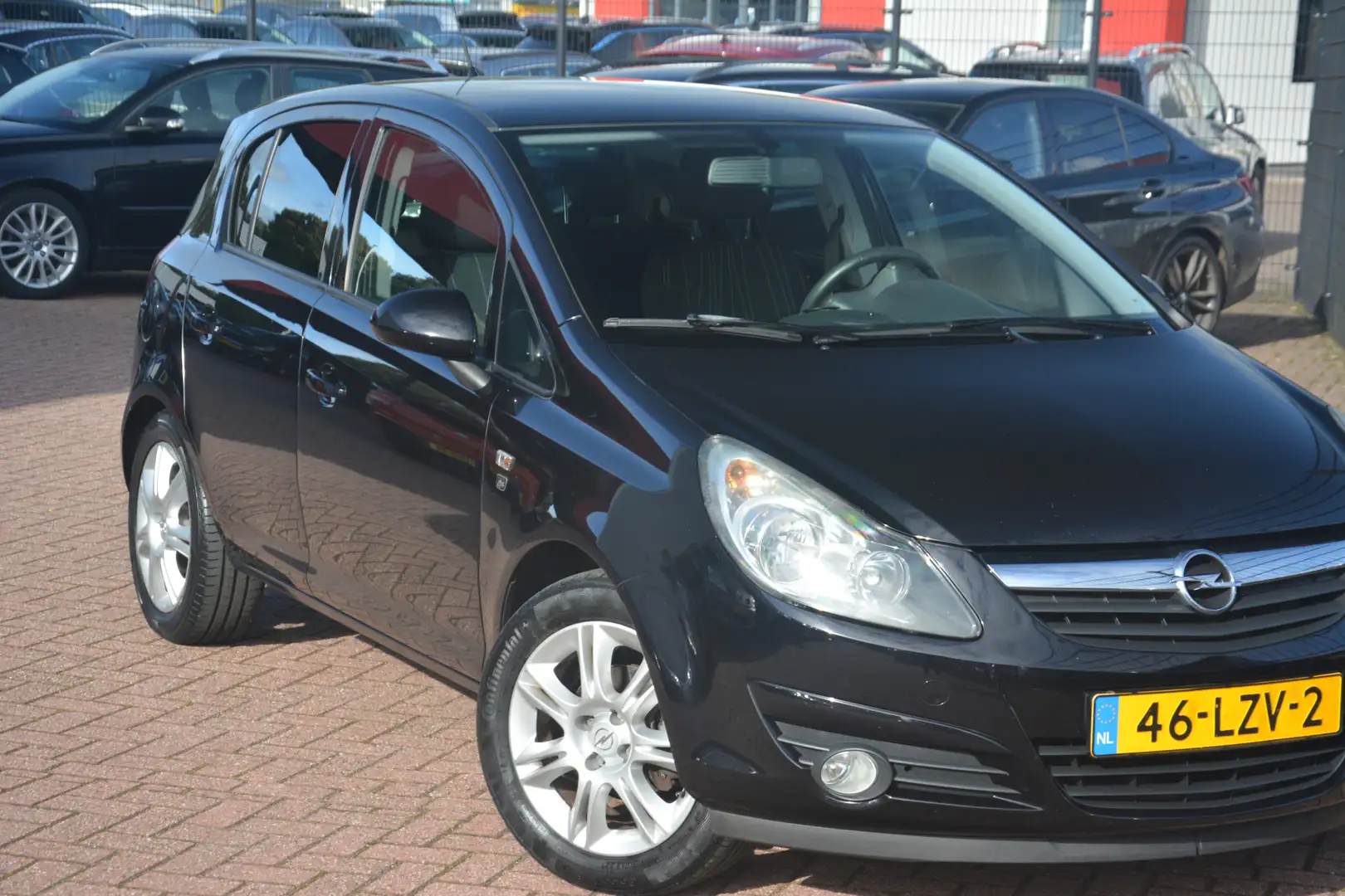 Opel Corsa 1.4-16V '111' Edition | Airco | Cruise-control | P Zwart - 2
