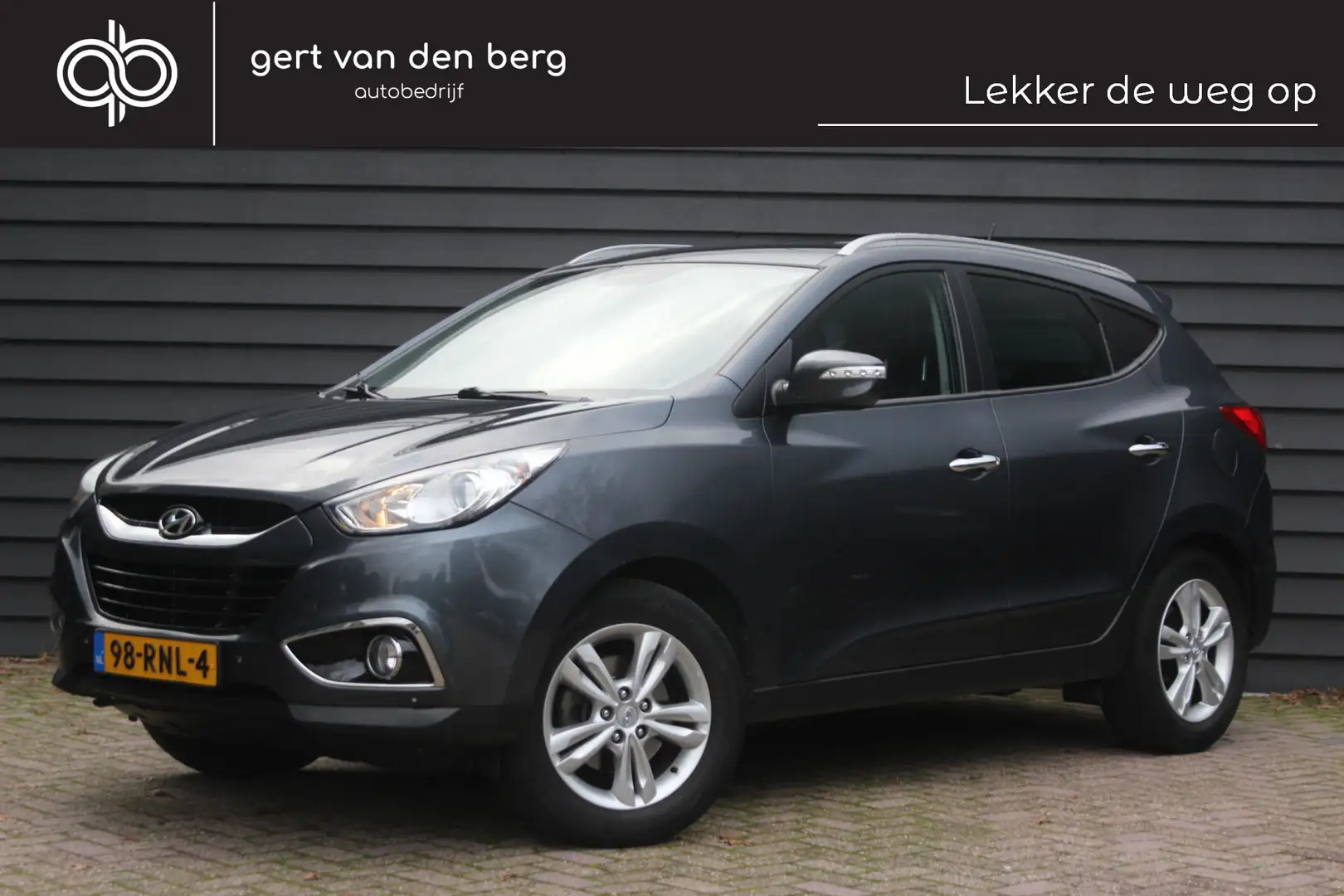 Hyundai iX35 2.0i 4WD Style - AUTOMAAT - TREKHAAK - CLIMA - CRU Grigio - 1