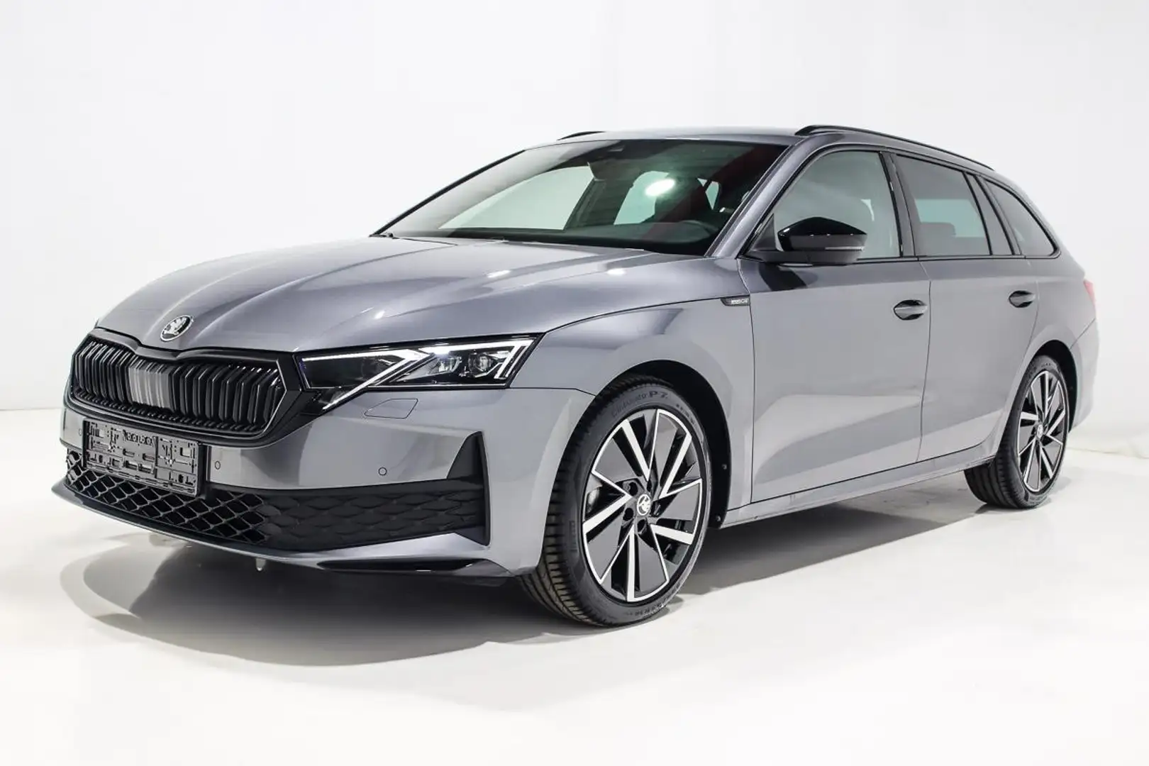 Skoda Octavia COMBI 2.0 TDI DSG SPORTLINE SEMI CUIR LED GPS JA18 Grijs - 2
