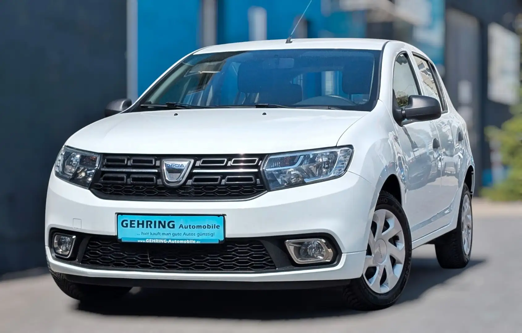 Dacia Sandero 1,0 TCe 75 Klima Navi Allwetter 1.H Wit - 1