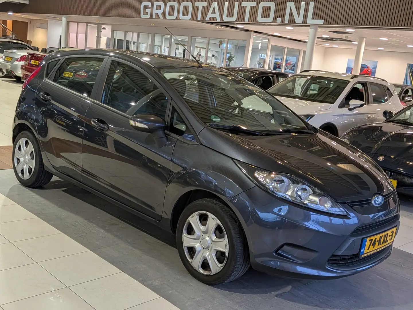 Ford Fiesta 1.25 Limited Airco, Trekhaak, Stuurbekrachtiging Grau - 1