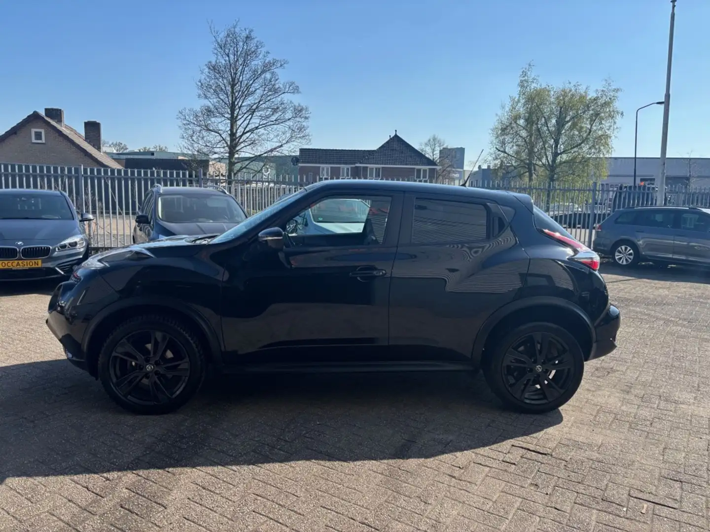 Nissan Juke 1.2 DIG-T S/S Tekna 6 MND GAR CLIMA LEER NAVI CRUI Zwart - 2