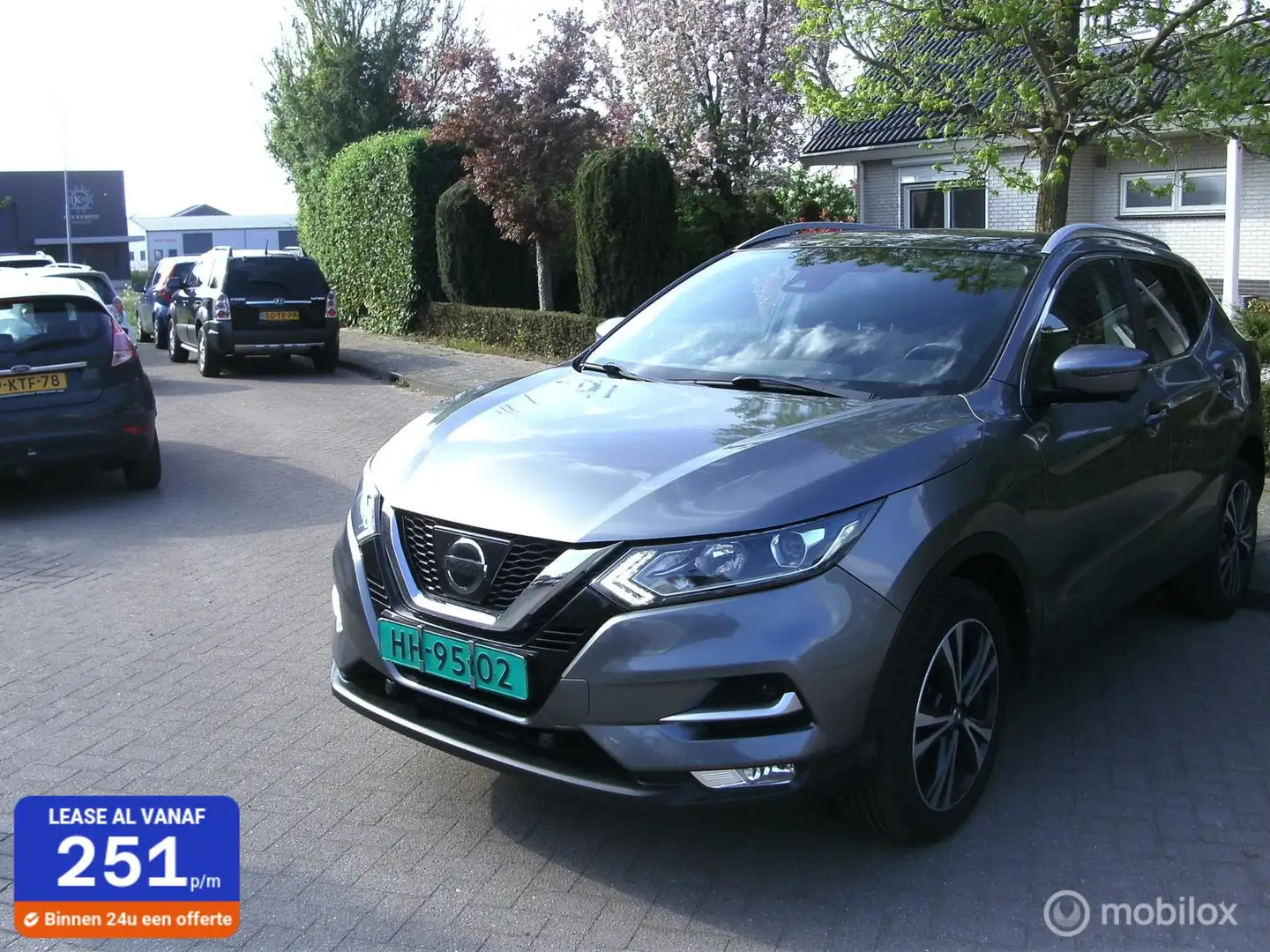 Nissan Qashqai 1.2 Business Edition bj 2018 74281 km Grijs - 1