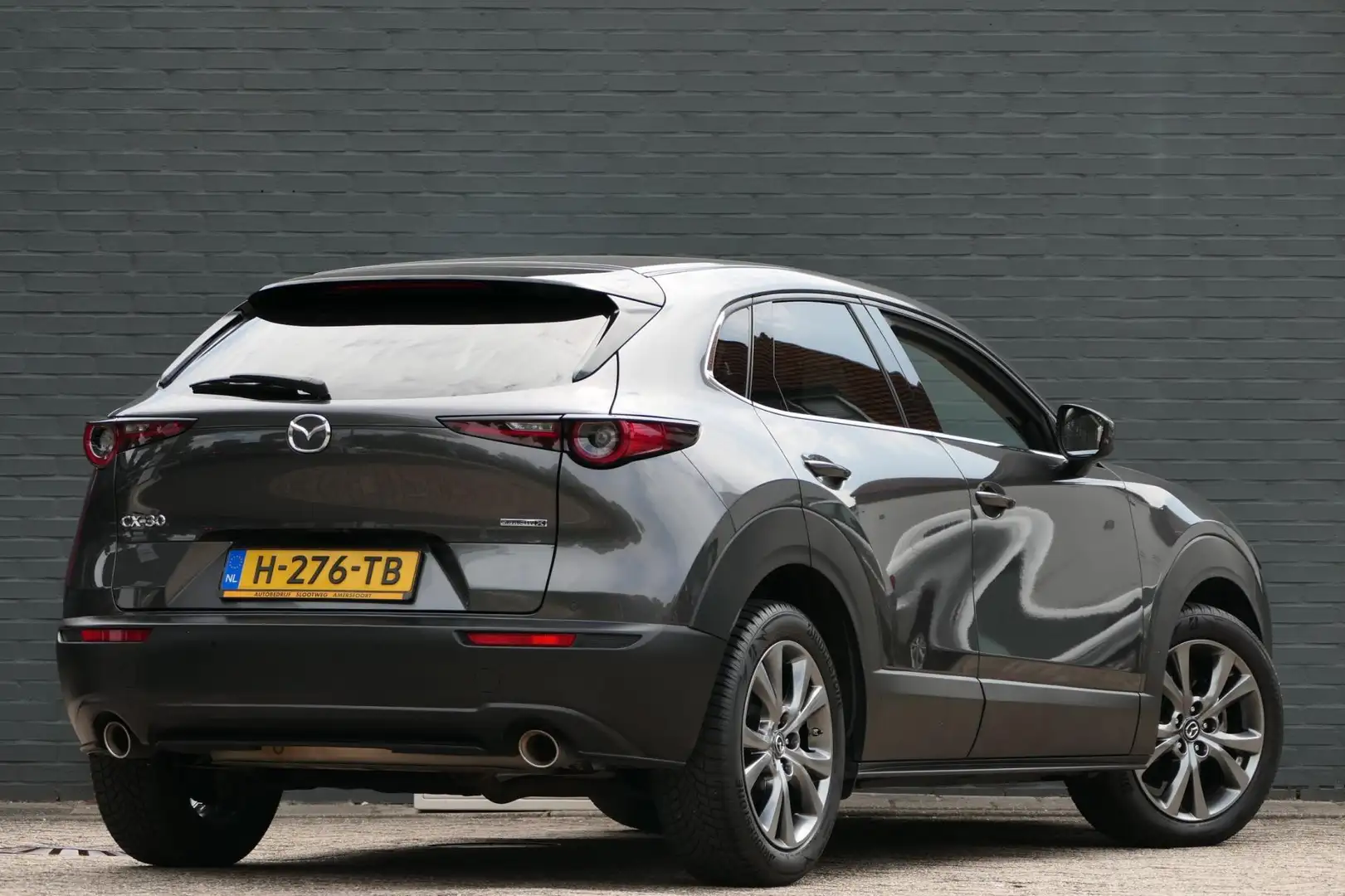 Mazda CX-30 2.0 SkyActiv-X 180PK Luxury Navi | Trekhaak | Bose Gris - 2
