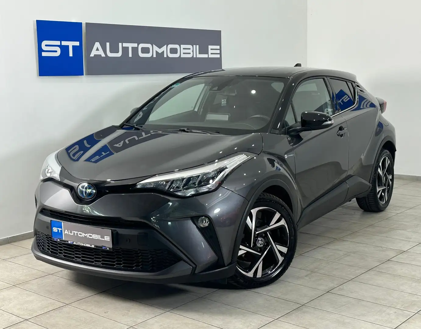 Toyota C-HR Hybrid Flow Aut. // 1.BESITZ // NAVI // AUX // PDC Grau - 1