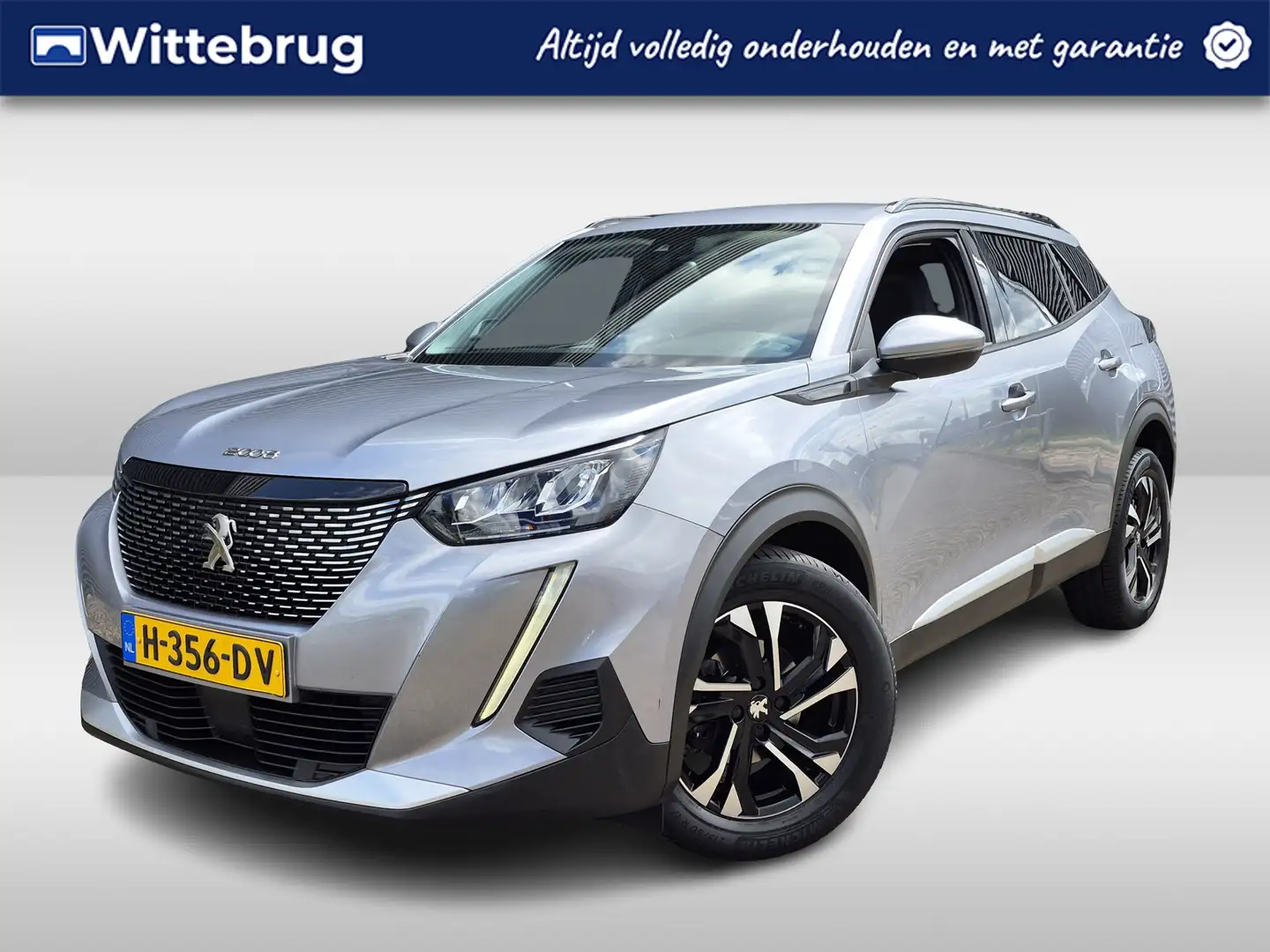 Peugeot 2008 1.2 PureTech Allure 130 PK | Navigatie | Camera | Grijs - 1