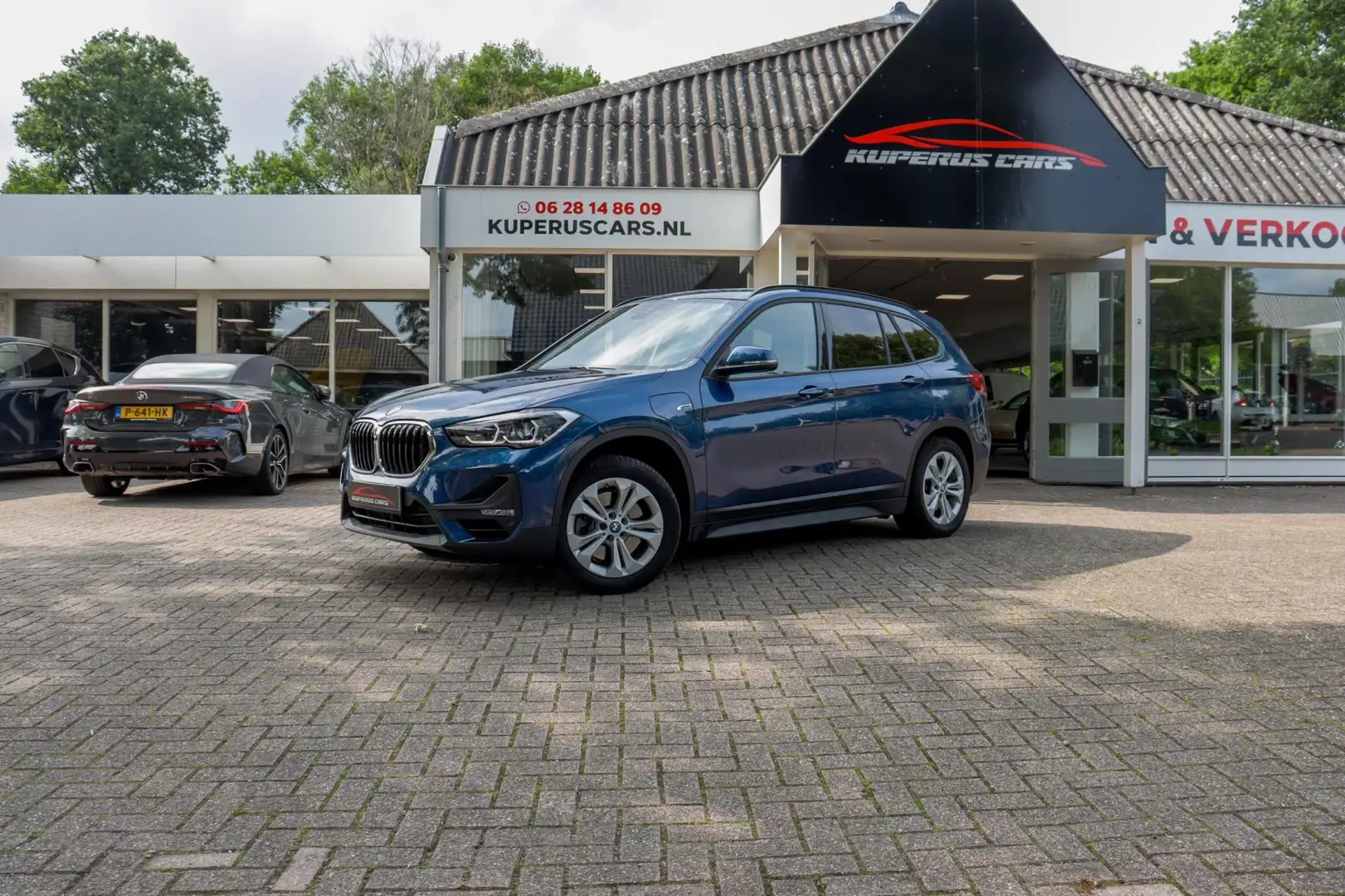 BMW X1 XDrive25e High Executive Carplay/Dealer/Pano/Trekh Blauw - 1