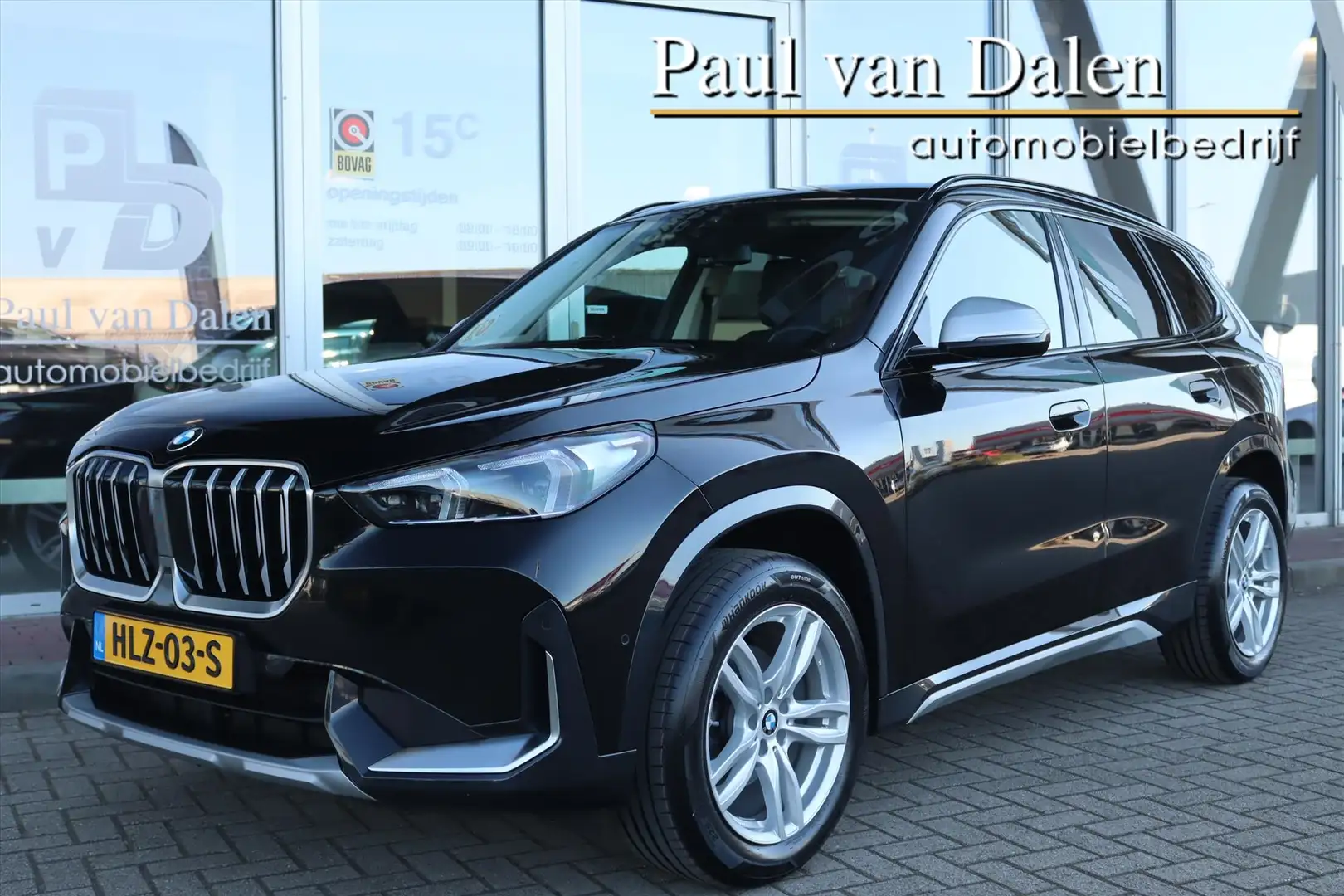 BMW X1 (u11) 1.8i SDRIVE AUTOMAAT PREMIUM X-LINE Sfeerver Zwart - 1