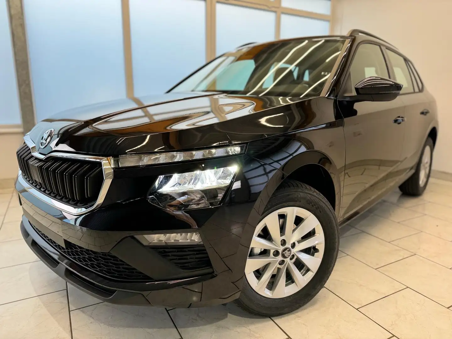 Skoda Kamiq Drive 1.0TSI - Automatik/Klima/CarPlay/SHZ Zwart - 1