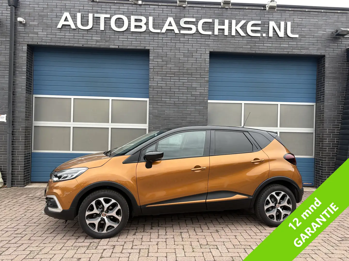 Renault Captur 0.9 TCe Intens, navi, parkeerassist, climate/cruis Arancione - 1