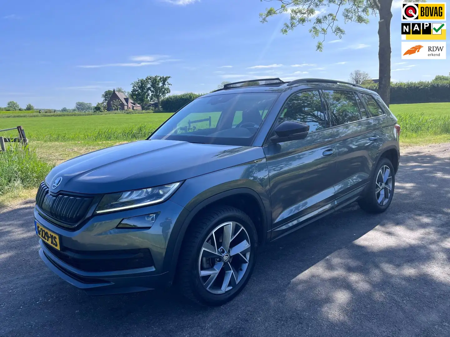 Skoda Kodiaq 1.5 TSI Sportline Business, pano, camera, 1e eig. Gris - 1
