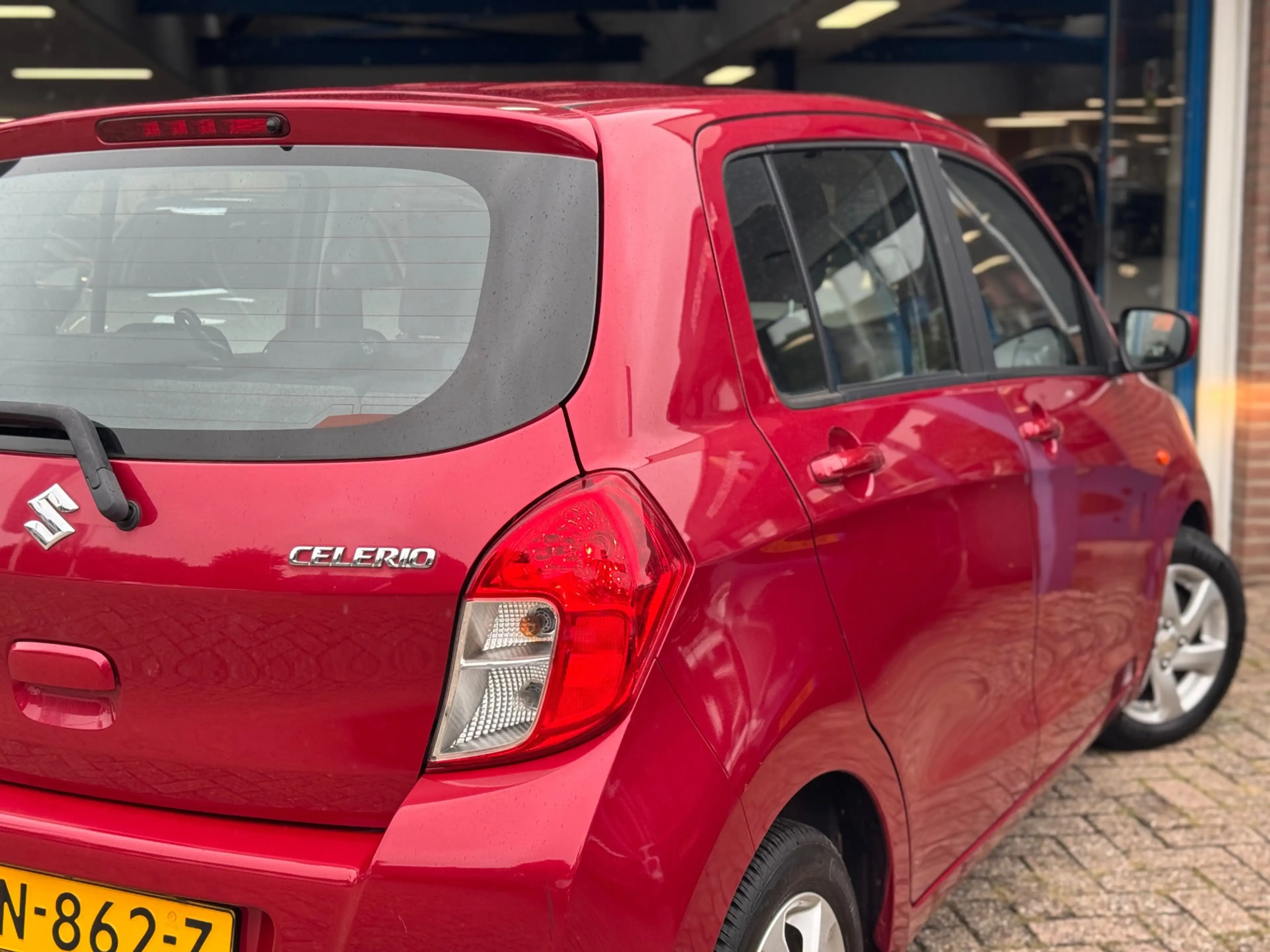 Suzuki Celerio 1.0 Exclusive 2016 Rood AIRCO APK NAP — photo 11