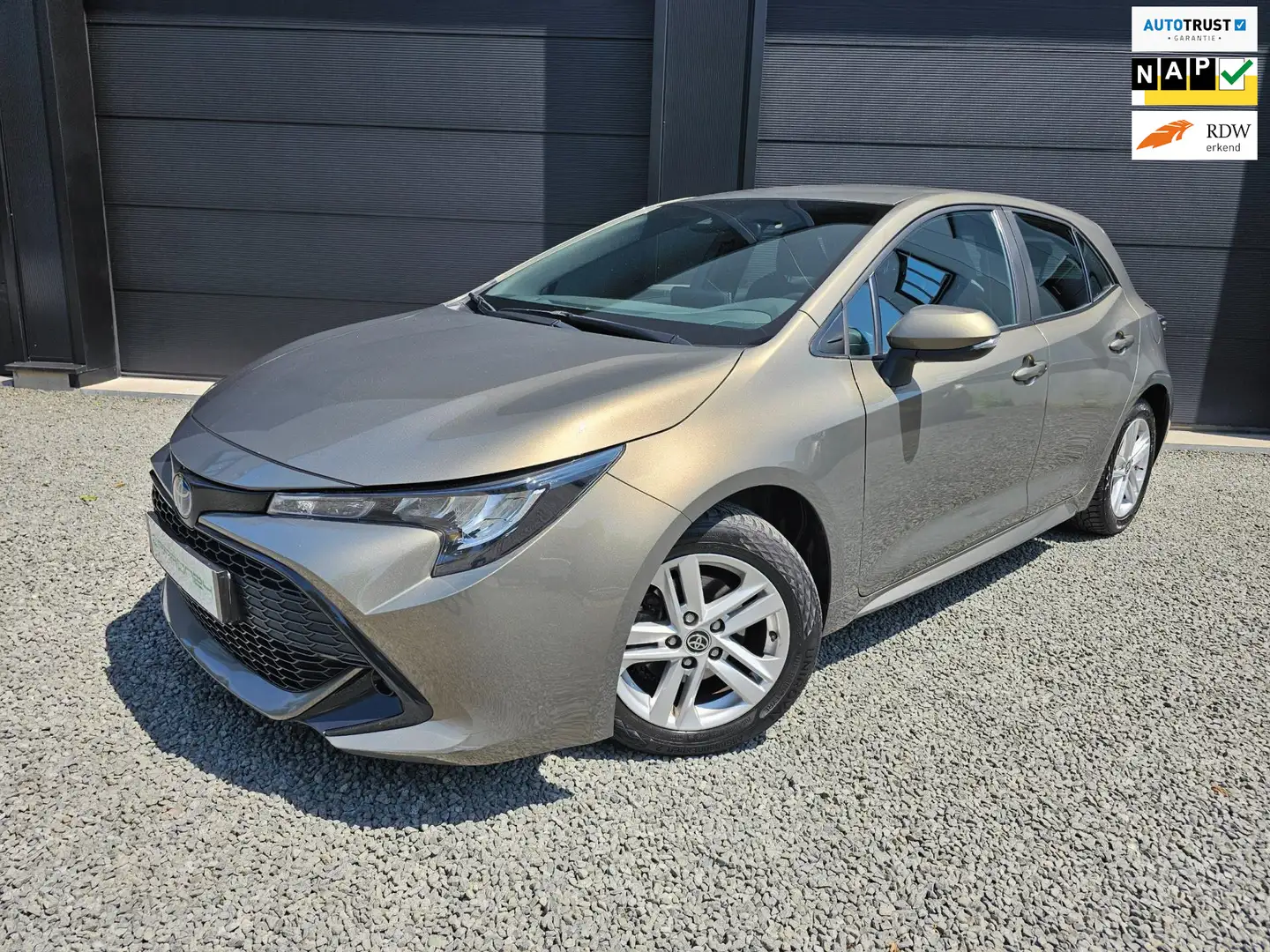 Toyota Corolla 1.8 Hybrid FACELIFT | 1e Eig. | Navi | ECC | LM | Vert - 1