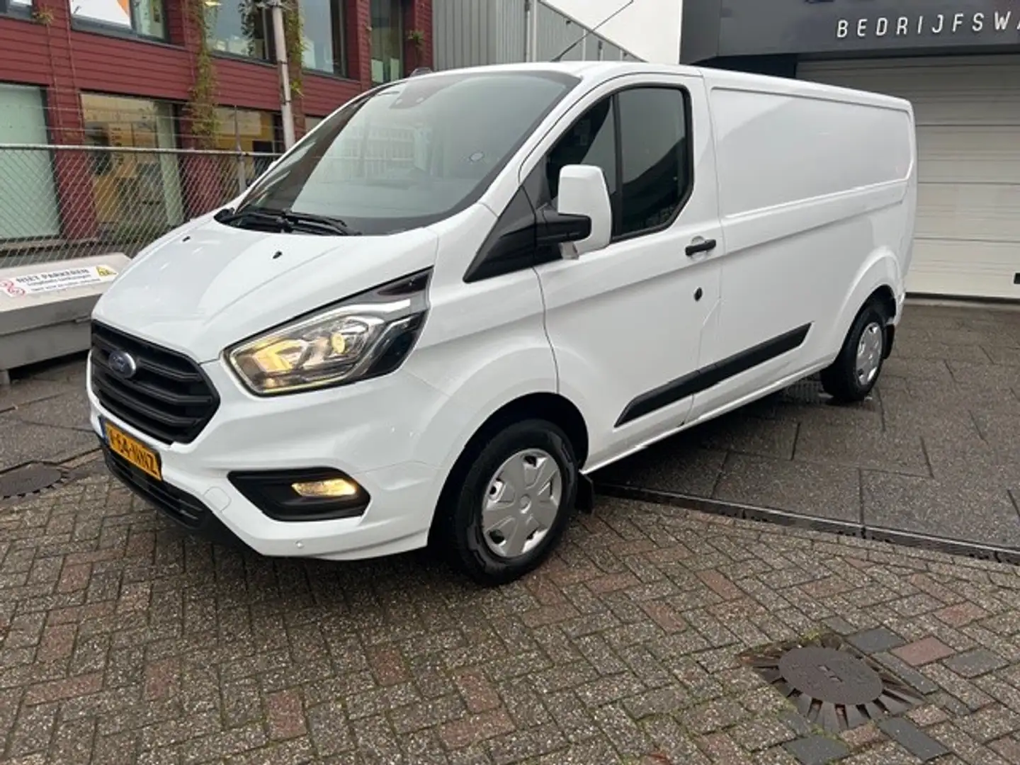 Ford Transit Custom 300 2.0 TDCI L2H1 Trend AIRCO I PDC I 3-ZITS I 1e Wit - 2