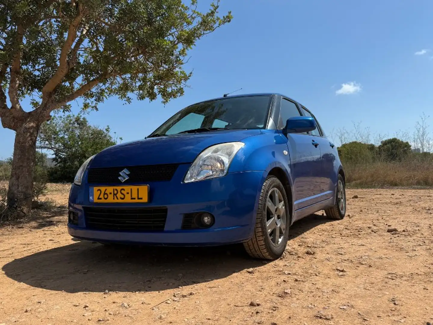 Suzuki Swift Swift Exclusive Ibiza 🏝️ - Auto in Nederland Azul - 1