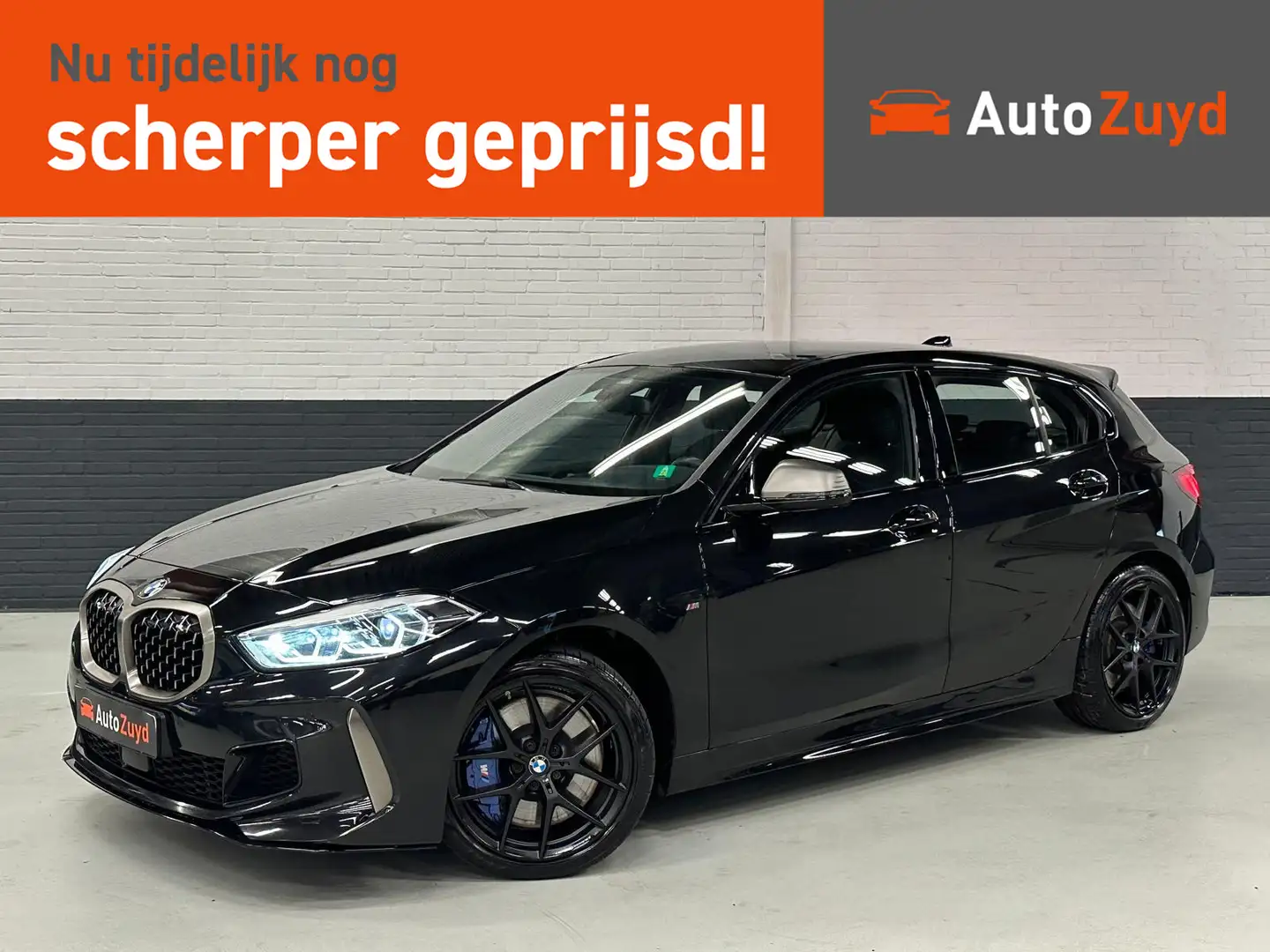 BMW 135 1-serie M135i xDrive High Executive / CarPlay / Na Zwart - 1