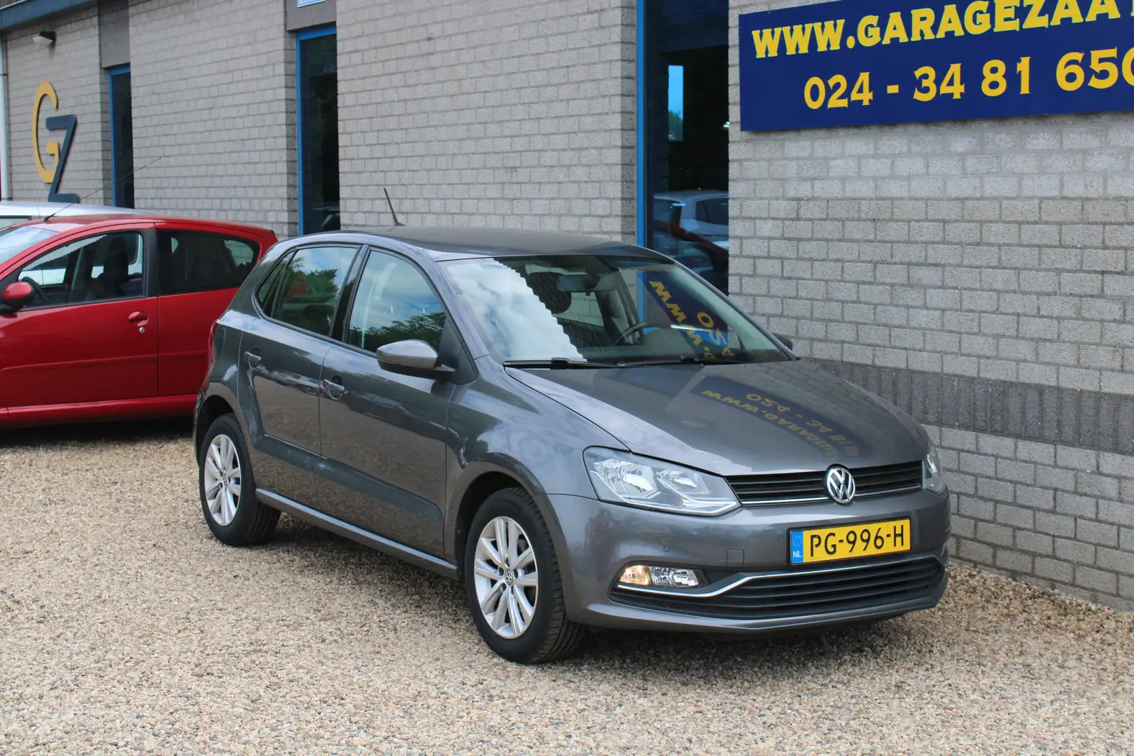 Volkswagen Polo 1.2 TSI Comfortline Business R Grijs - 1