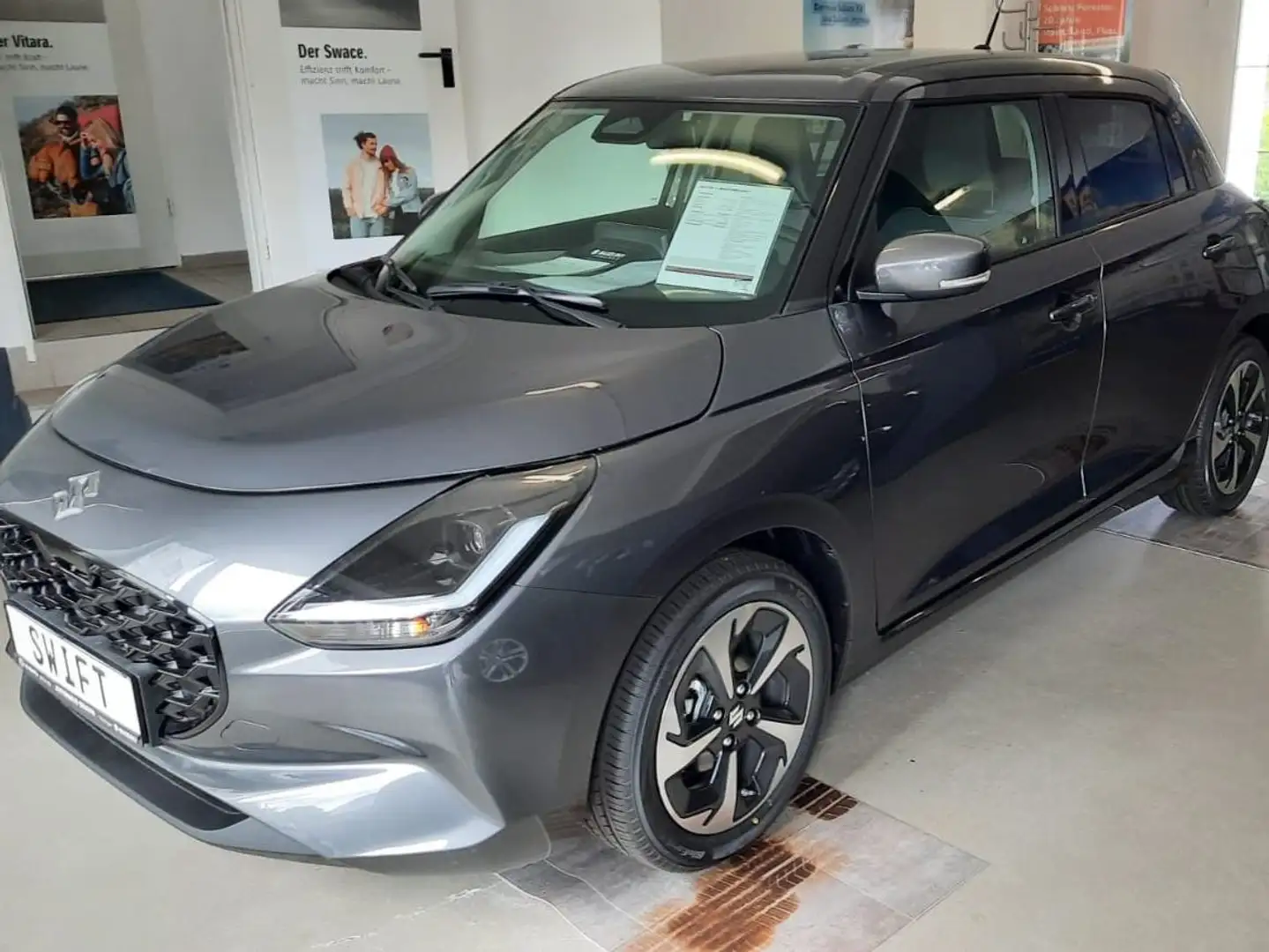 Suzuki Swift 1.2 Hybrid MT Comfort+ Grijs - 1