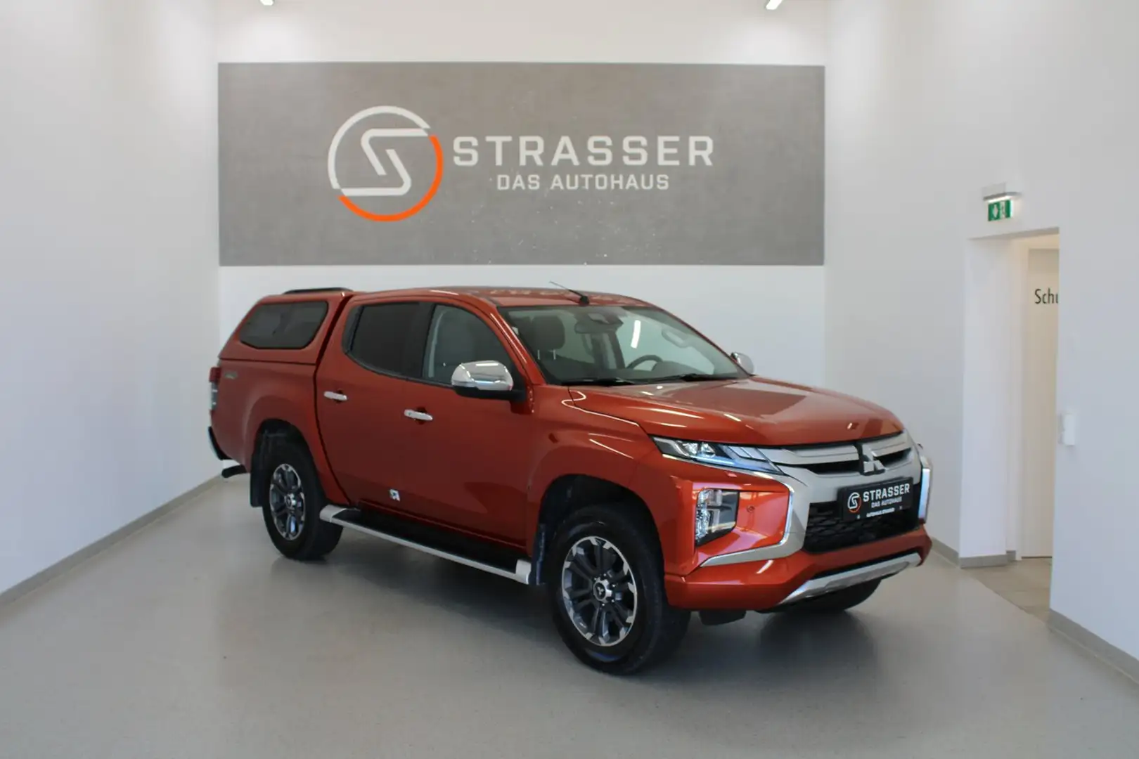 Mitsubishi L200 2,2 DI-D HP 4WD Doppelkabine Diamo Orange - 1