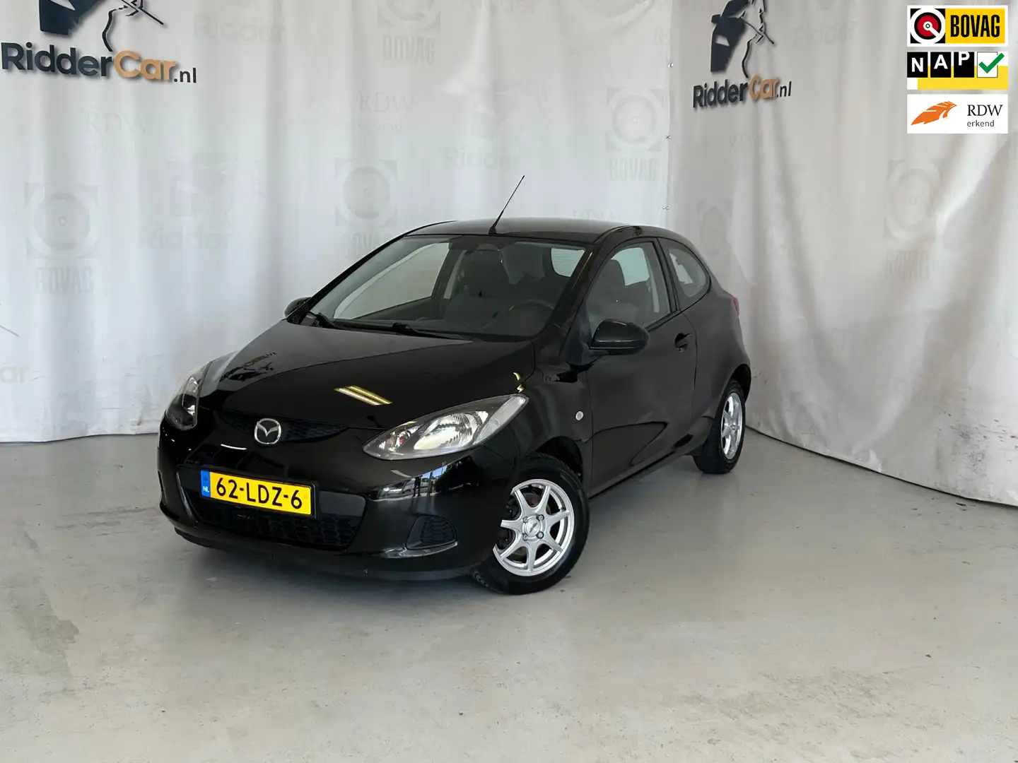 Mazda 2 1.3 XS|NAP|PARK SENS|ELEK RAMEN VOOR|RADIO|APK 06- Zwart - 1