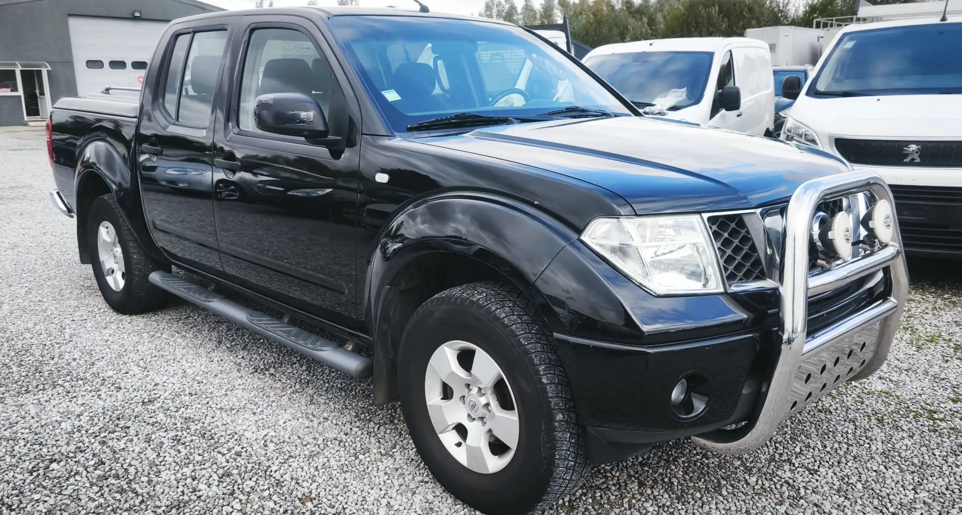 Nissan Navara 2.5 dCi (174 ch)_12/2006💢EUR.4_A/C💢 Noir - 1