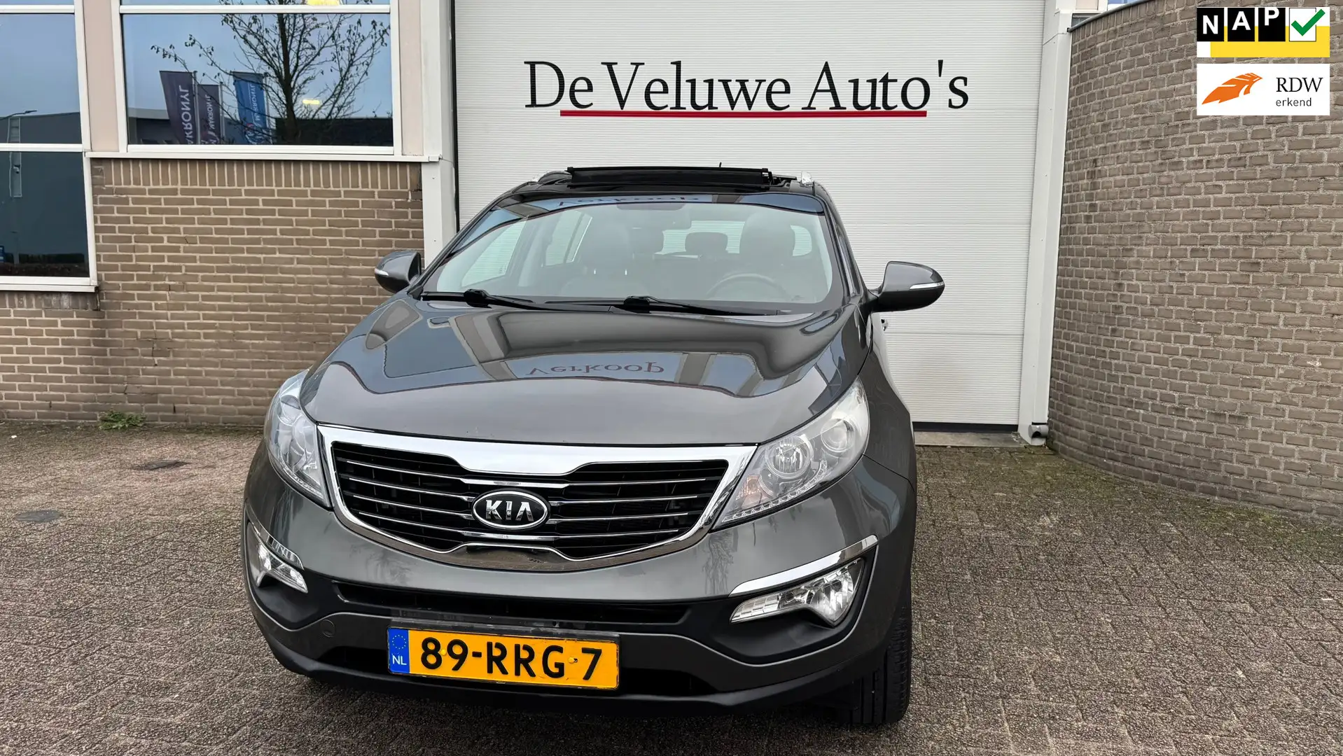 Kia Sportage 1.6 GDI X-ecutive Plus Pack |Pano|PDC|Trekhaak| Grijs - 1