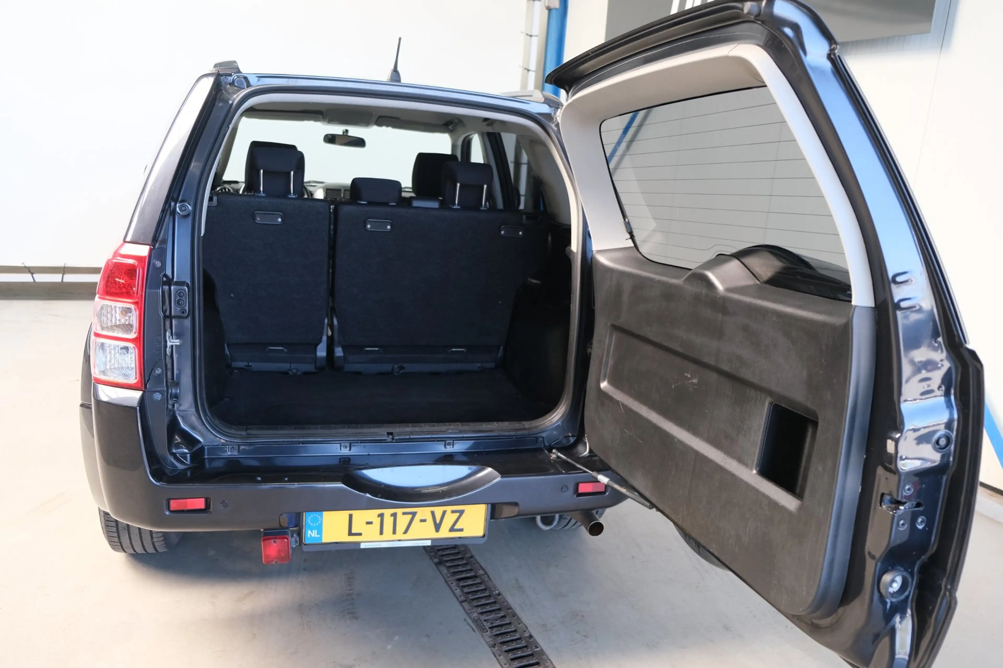 Suzuki Grand Vitara 2.4 Exclusive Automaat - Airco, PDC. — photo 7