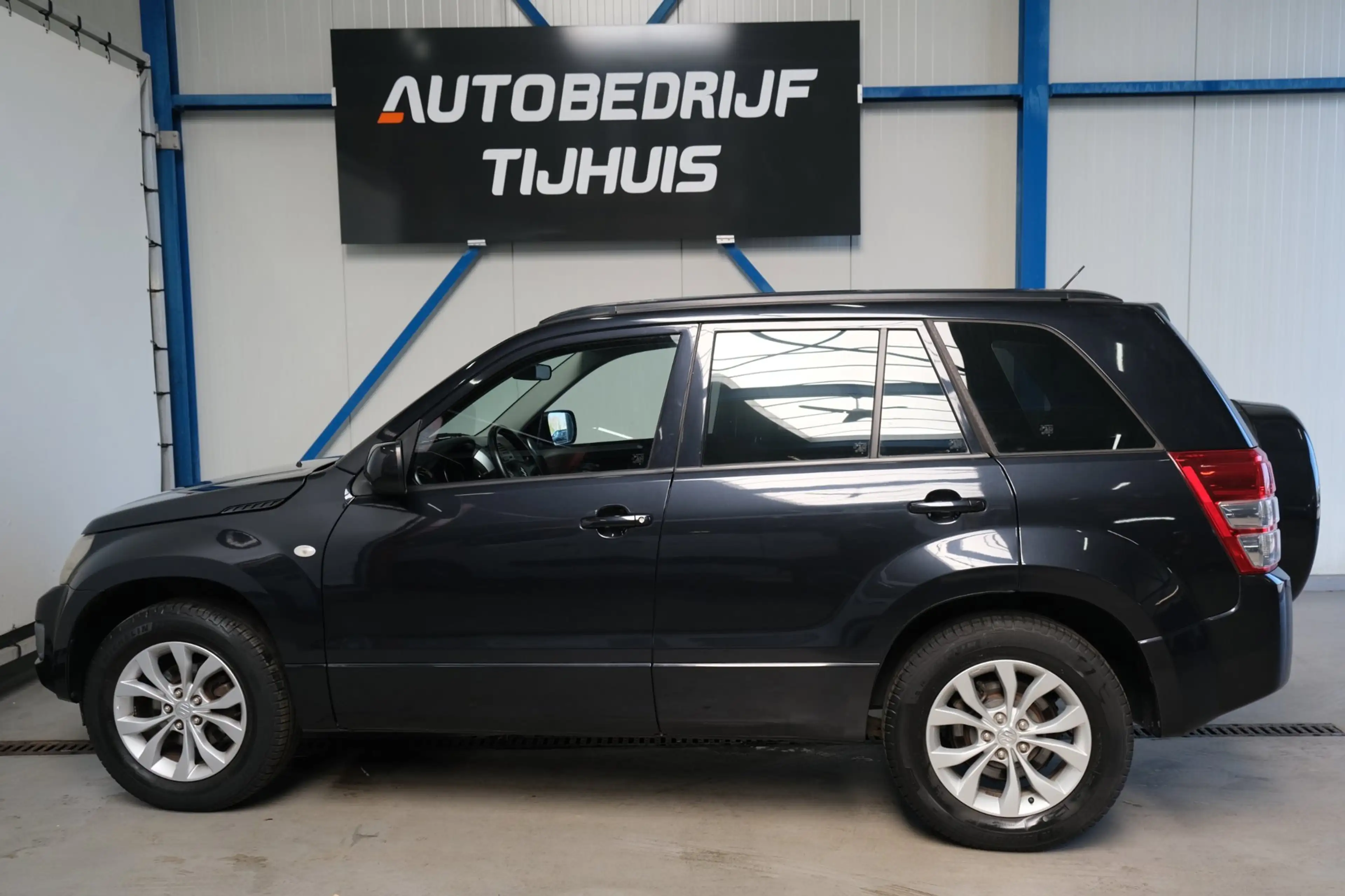 Suzuki Grand Vitara 2.4 Exclusive Automaat - Airco, PDC. — photo 5