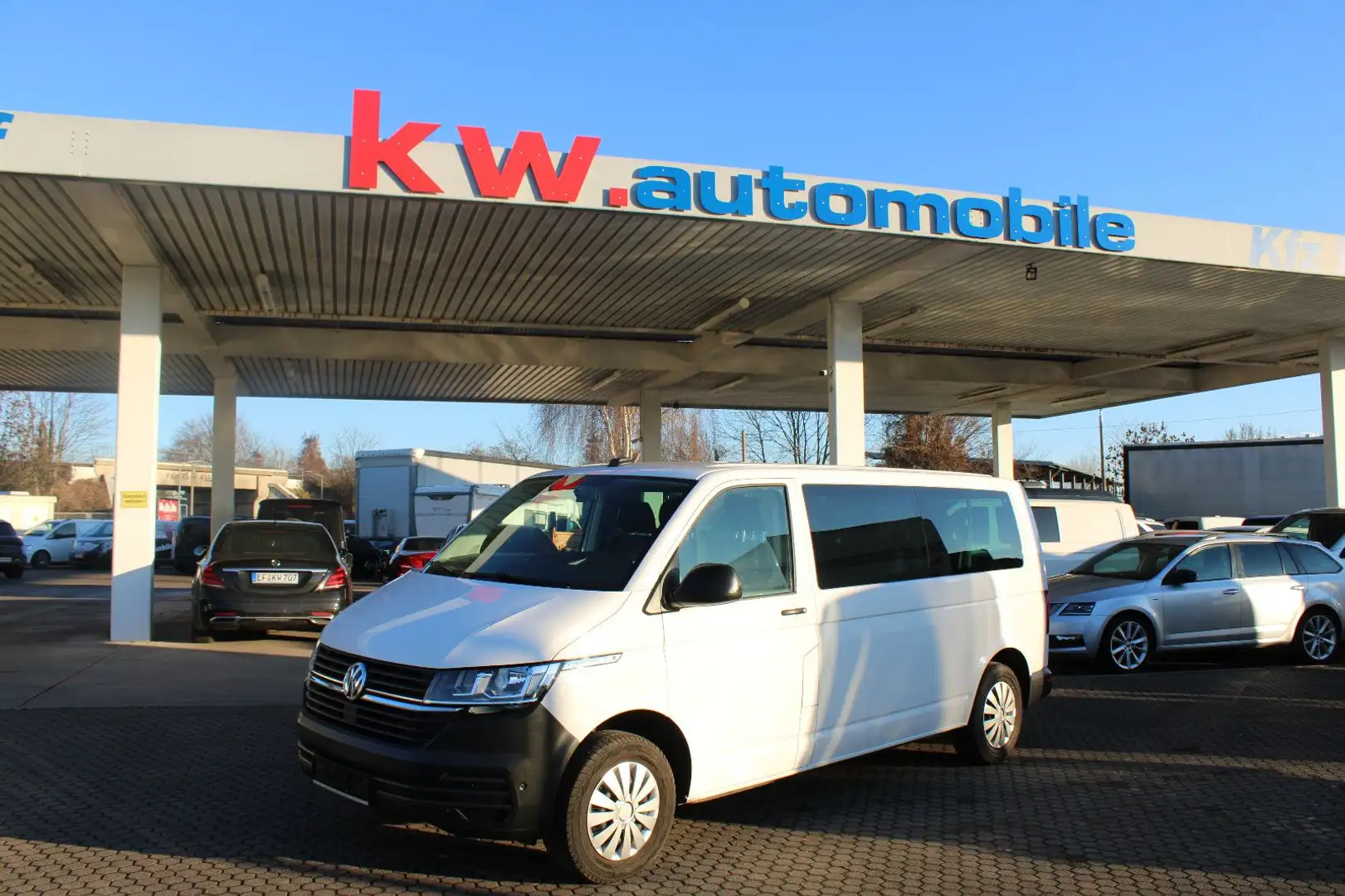 Volkswagen T6 Caravelle T6.1 Caravelle Lang,Klima,App,PDC,9 Sitze,DAB,BT Weiß - 1