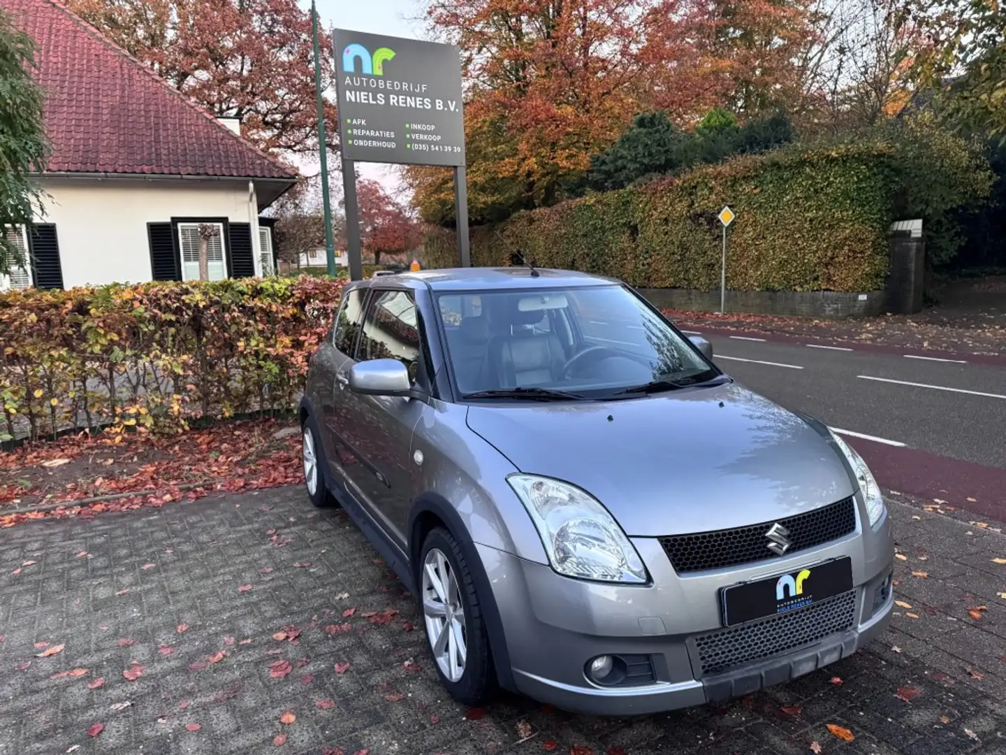 Suzuki Swift 1.3/Airco/NAP/Leer/elektr ramen Gris - 1